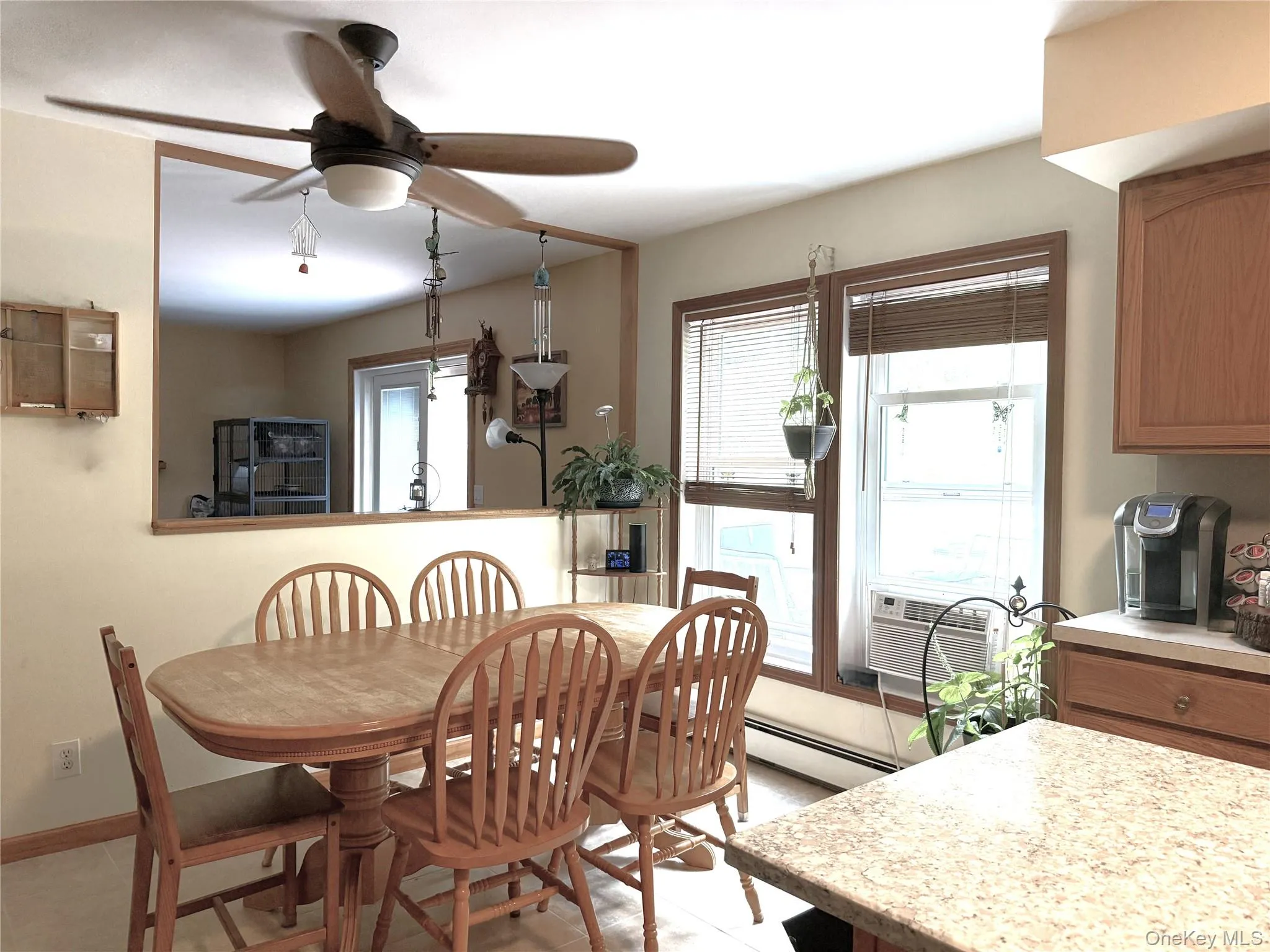 Spacious dining area fits a full-size dining table. The large opening looks into the family room. Spacious dining area fits a full-size dining table. The large opening looks into the family room.