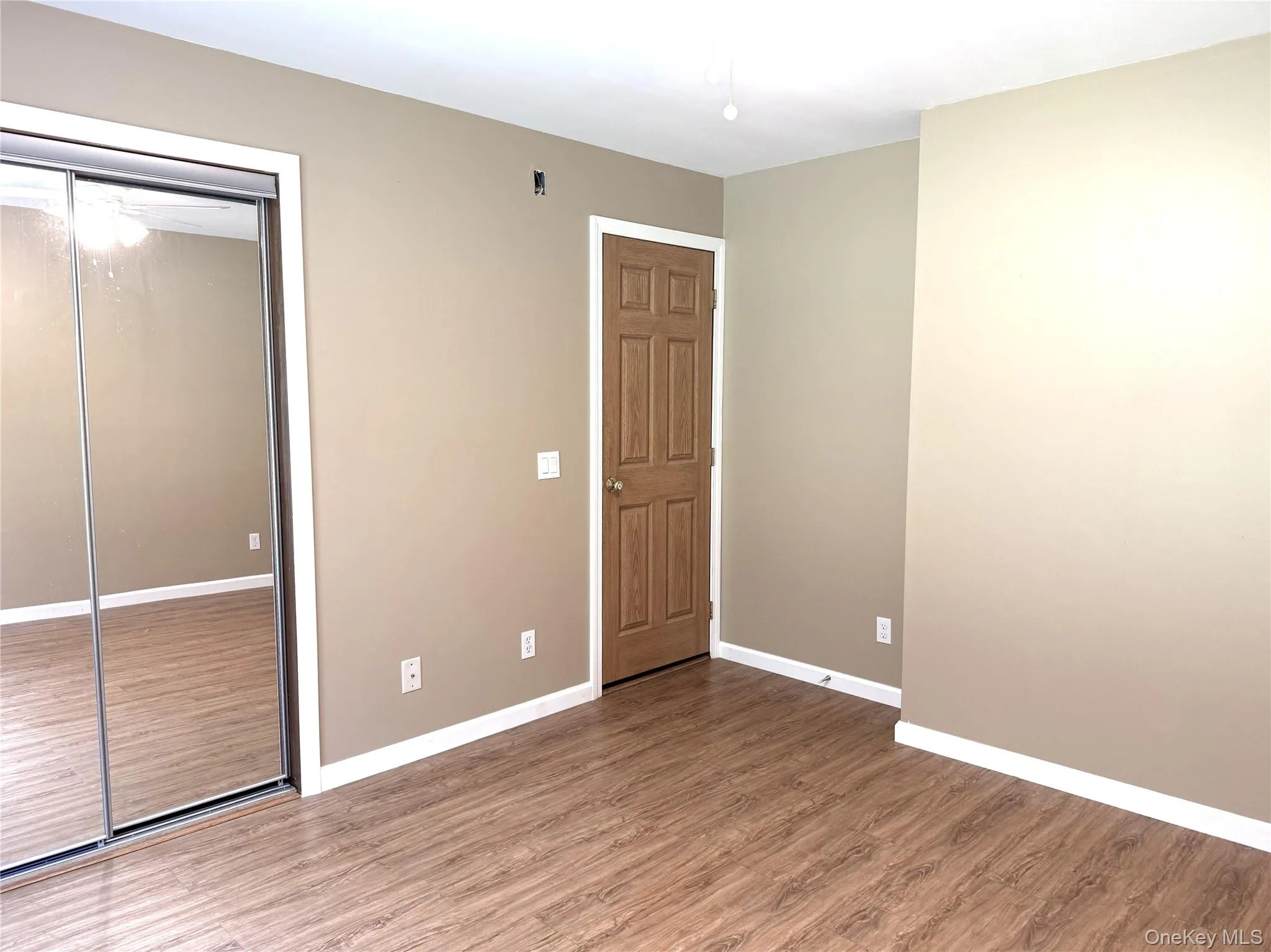 BR 3. Good-size mirrored door closet. BR 3. Good-size mirrored door closet.