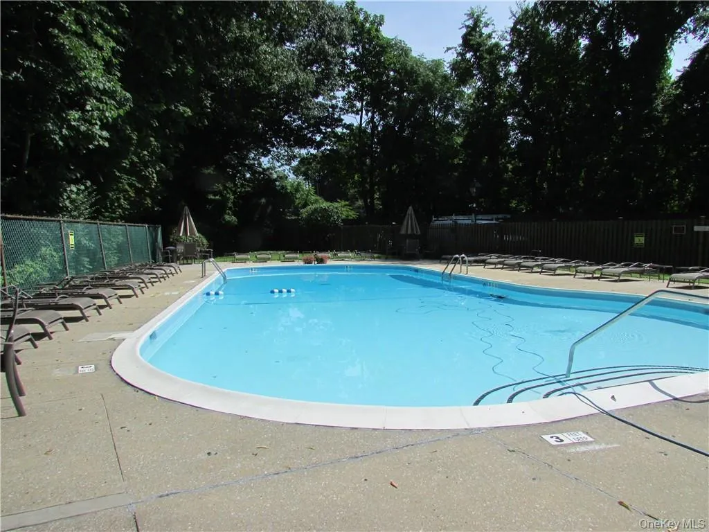 View of pool featuring a patio View of pool featuring a patio