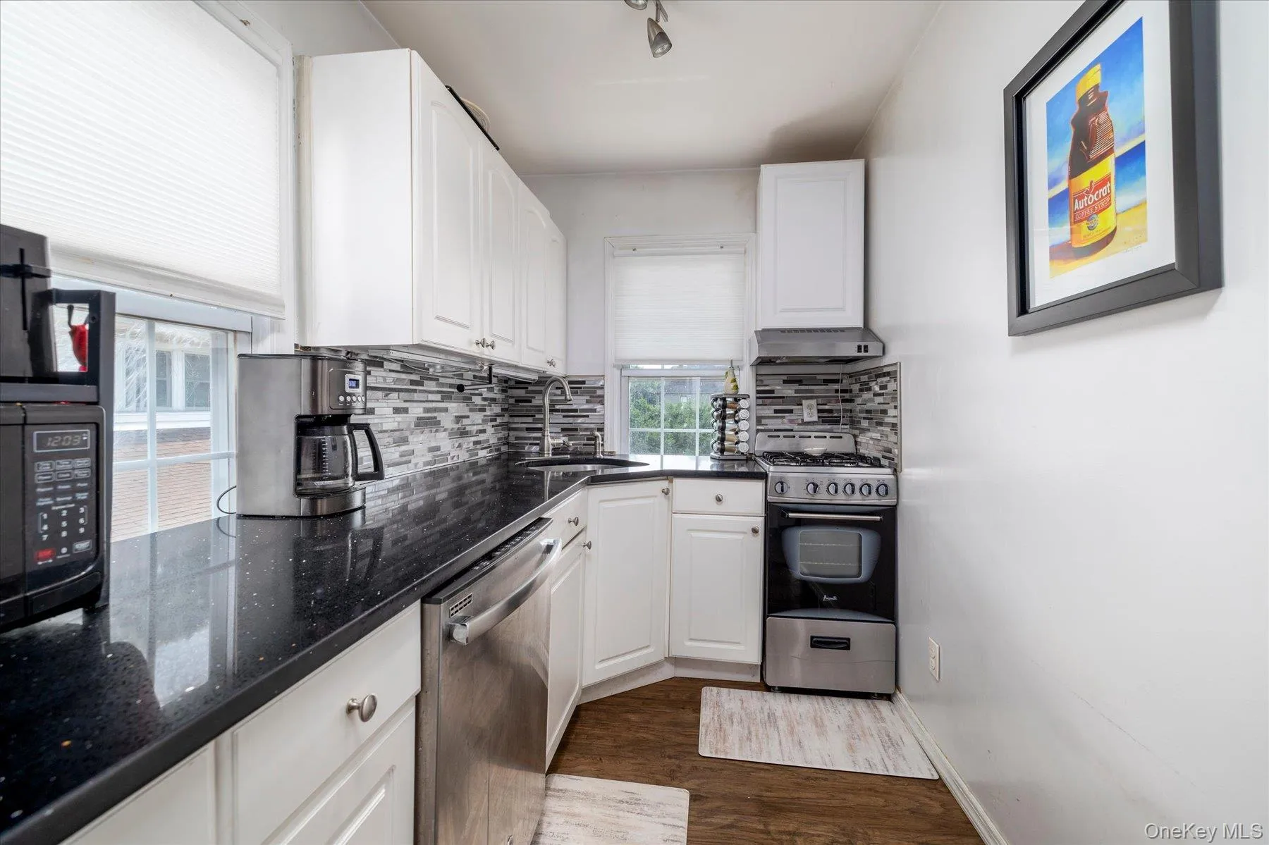 Kitchen with stainless steel appliances Kitchen with stainless steel appliances