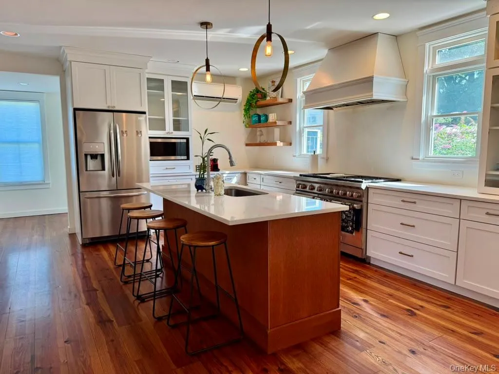 Large island, lots of cabinets, SS appliances. 6 burner gas stove. Large island, lots of cabinets, SS appliances. 6 burner gas stove.