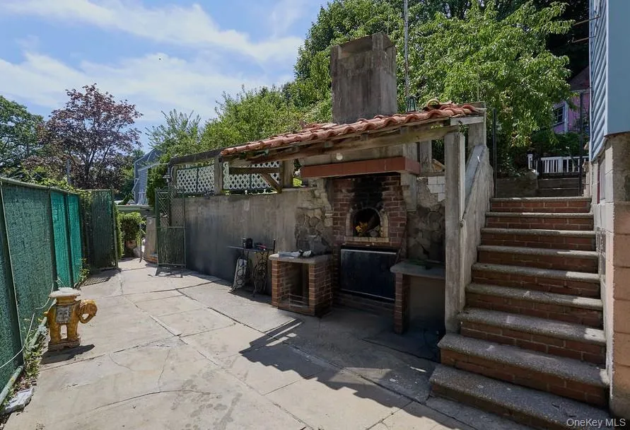 Patio in front of the basement entrance. Patio in front of the basement entrance.