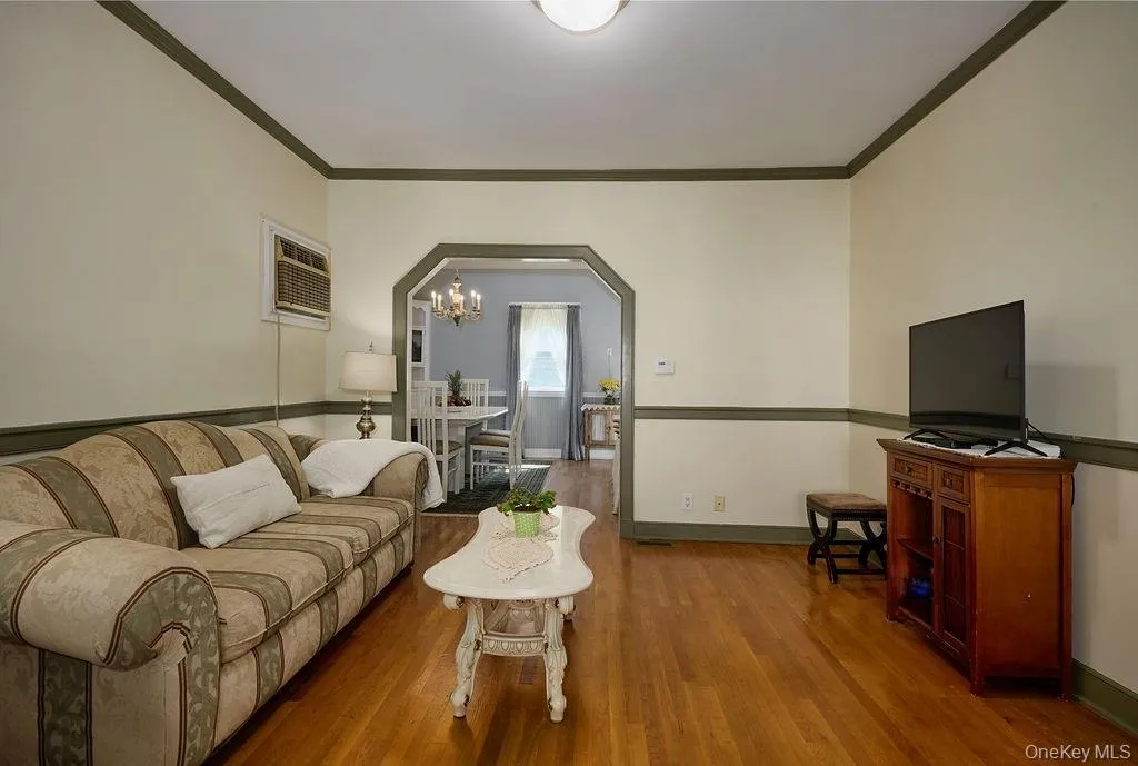 Hardwood flooring throughout the living room and dining room. Hardwood flooring throughout the living room and dining room.