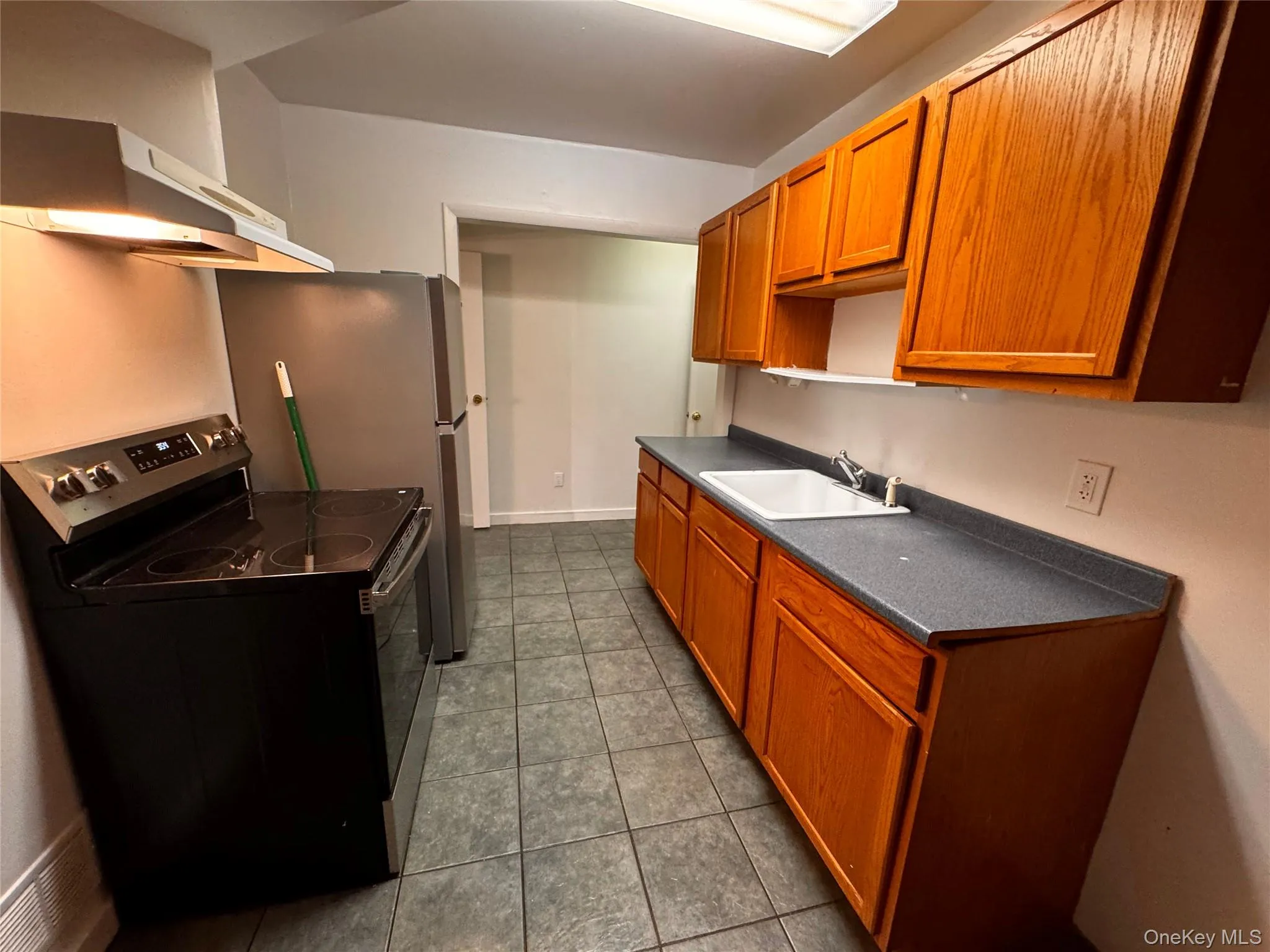 Kitchen from the eat-in area. Kitchen from the eat-in area.
