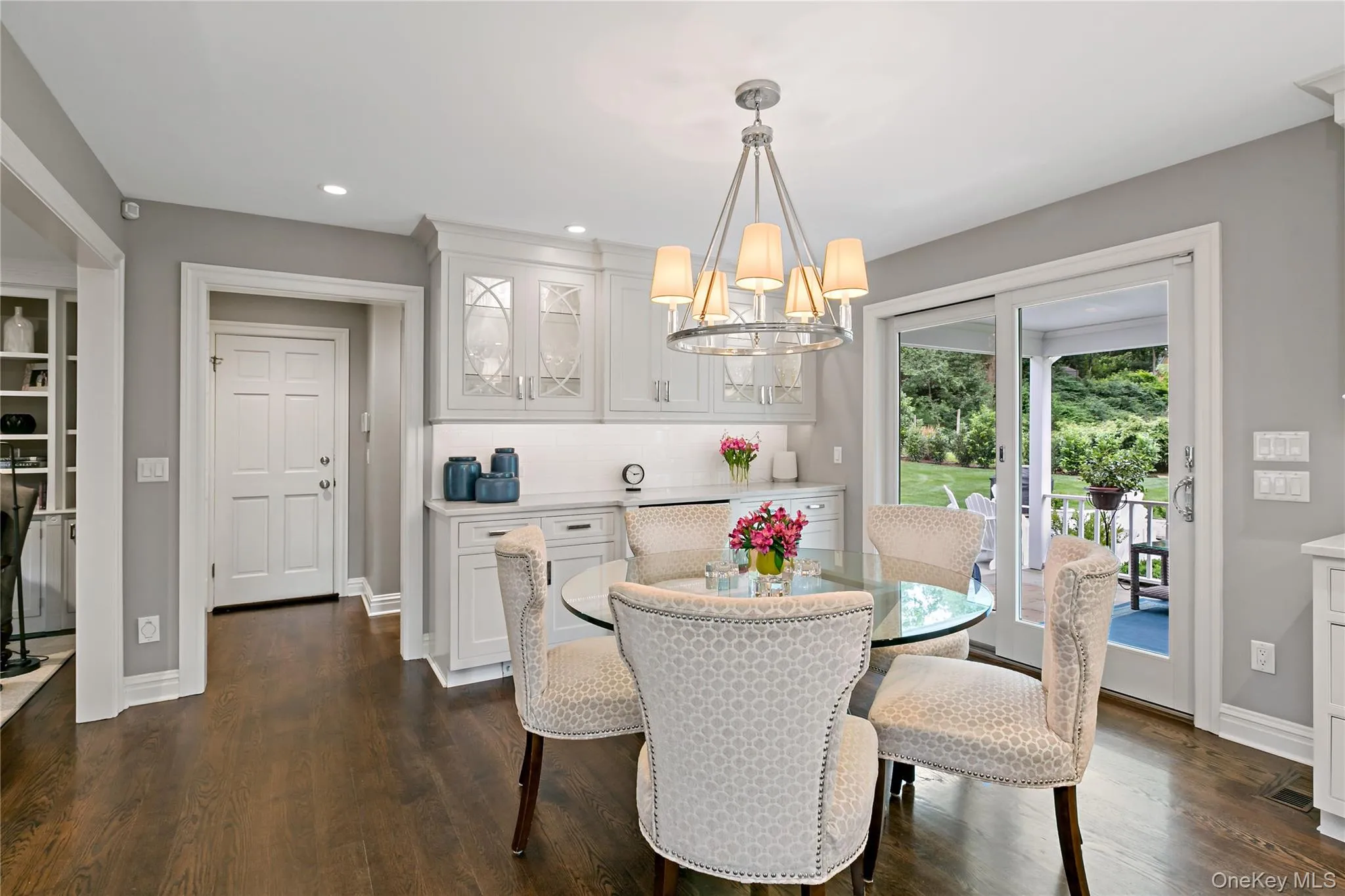 The Kitchen has a 48 Bottle Wine Cooler in Cabinetry behind the table, Ample Counter Space for Entertaining and Access to the Oversized Two Car Garage The Kitchen has a 48 Bottle Wine Cooler in Cabinetry behind the table, Ample Counter Space for Entertaining and Access to the Oversized Two Car Garage