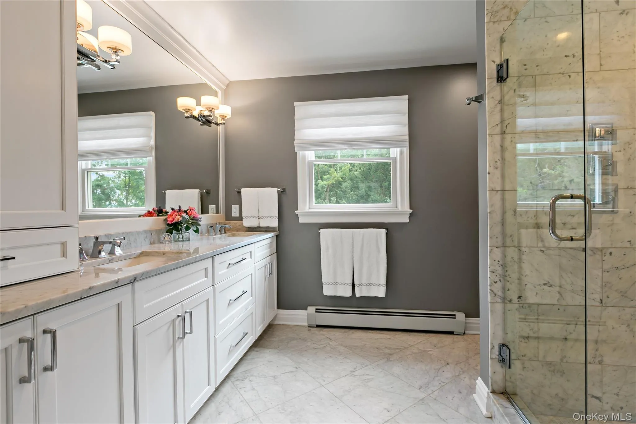 All Carrera Marble -Double Sink Vanity, Pattern Floor and a Large Shower All Carrera Marble -Double Sink Vanity, Pattern Floor and a Large Shower