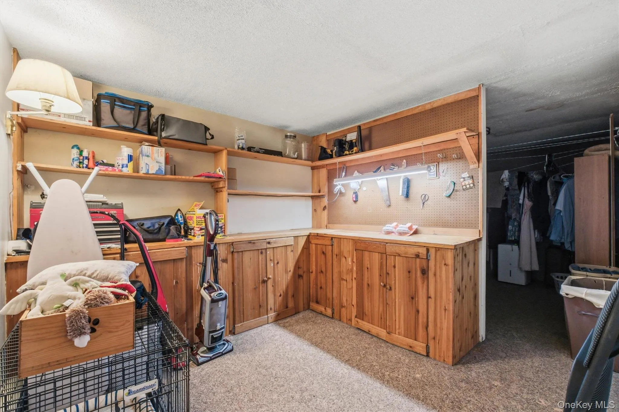And laundry room just beyond with extra storage And laundry room just beyond with extra storage