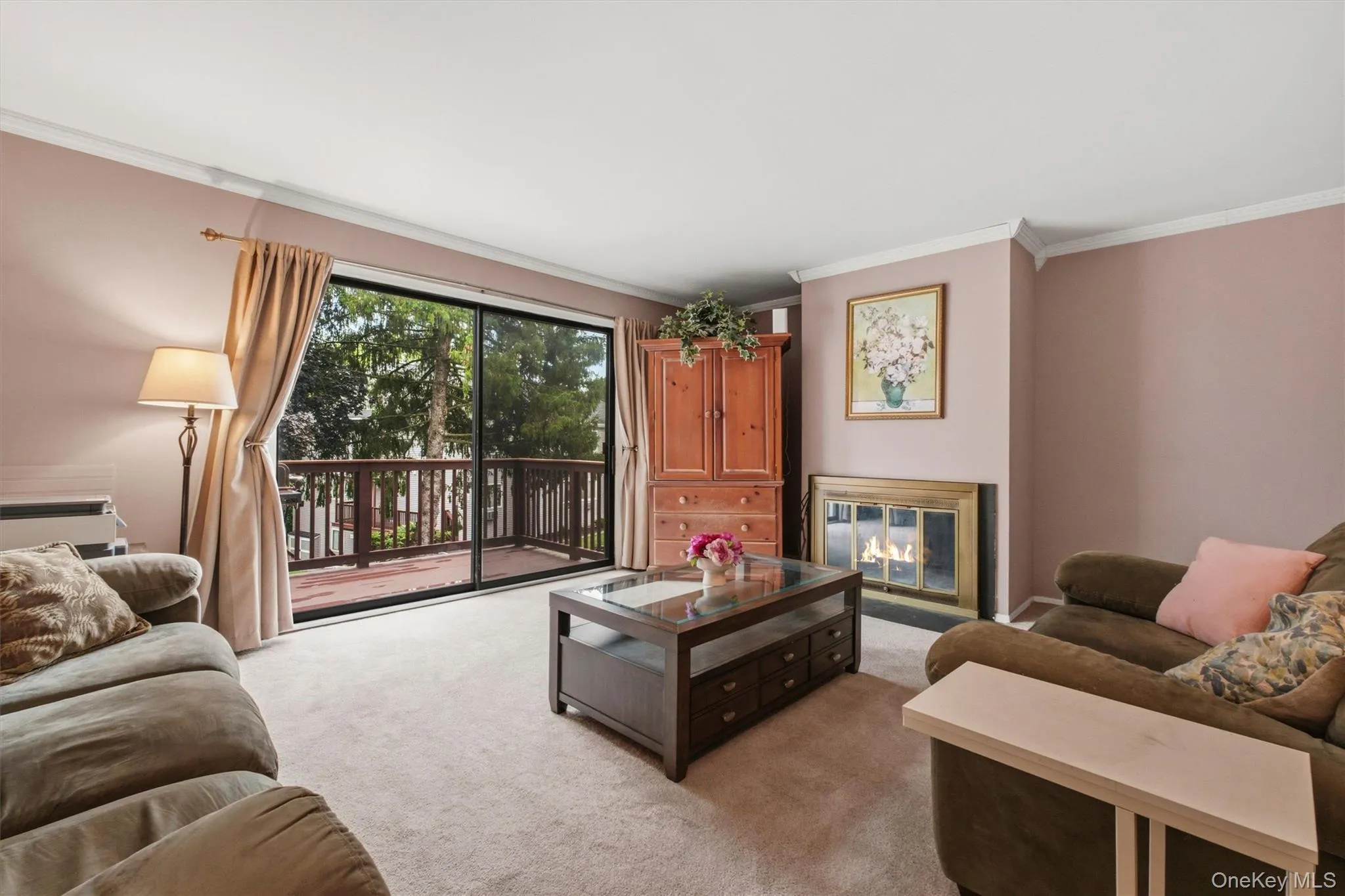 The sliding glass door brings in morning sunshine and leads to the deck The sliding glass door brings in morning sunshine and leads to the deck