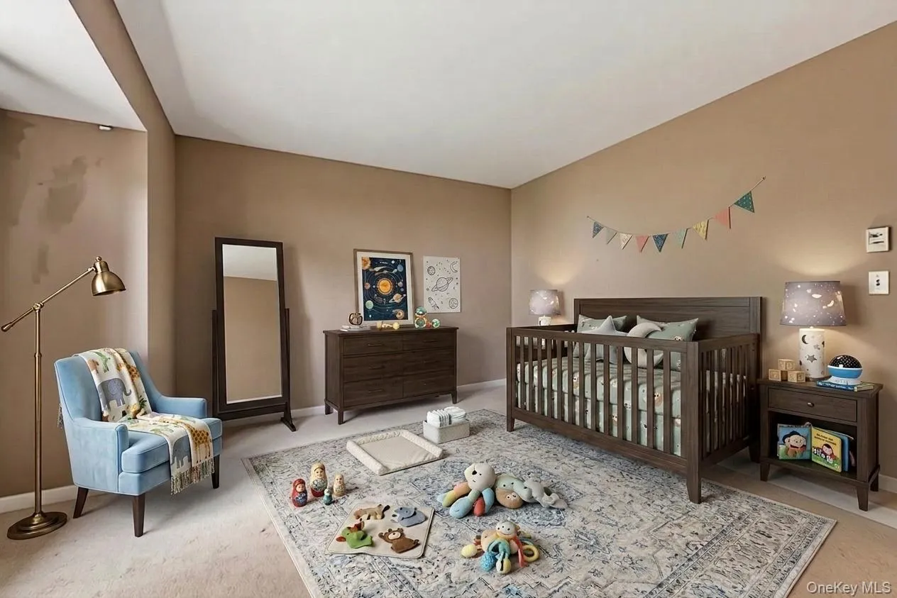 2nd bedroom virtually staged as a nursery 2nd bedroom virtually staged as a nursery