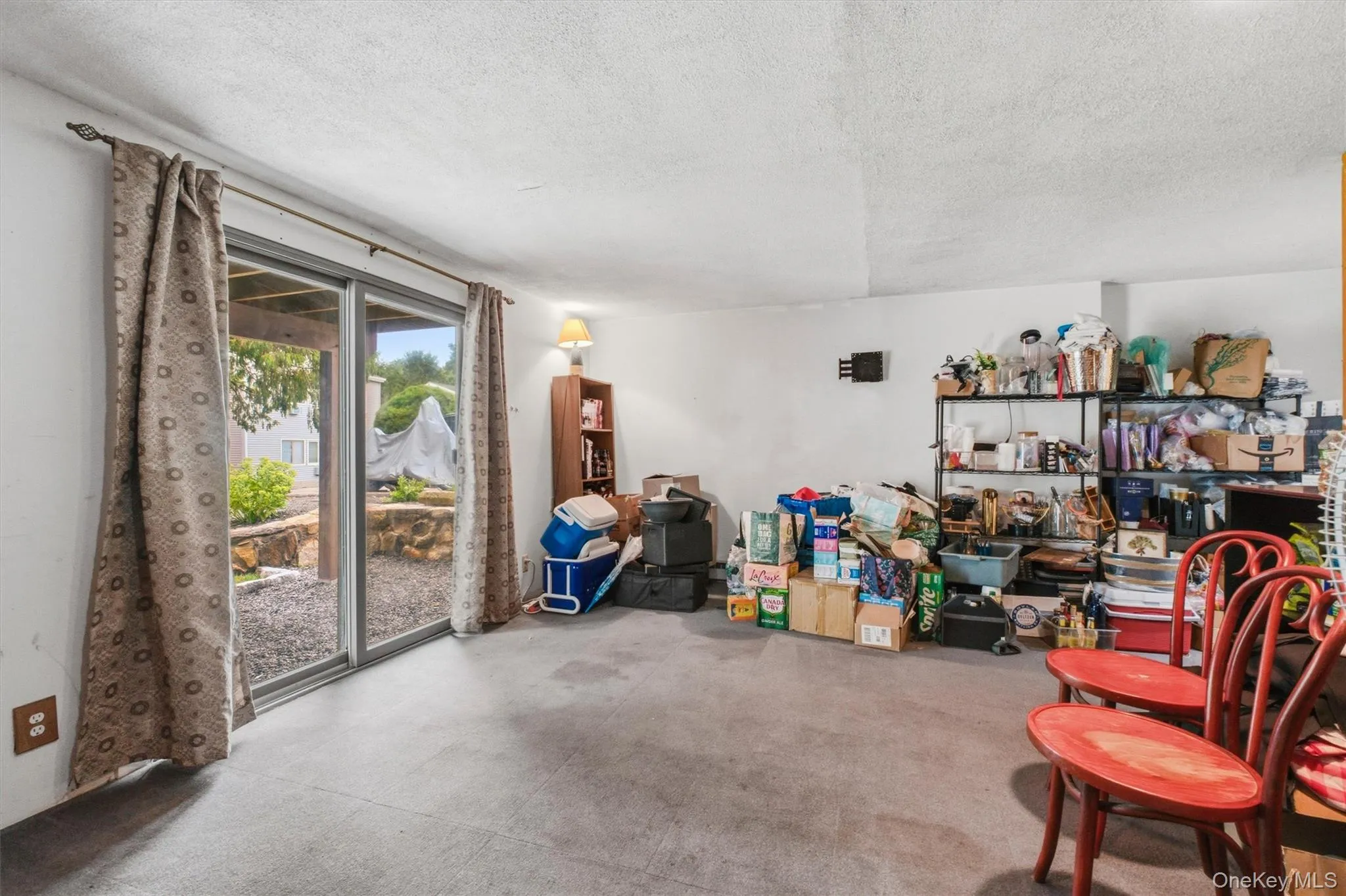 With additional access to outside through the sliding glass doors With additional access to outside through the sliding glass doors