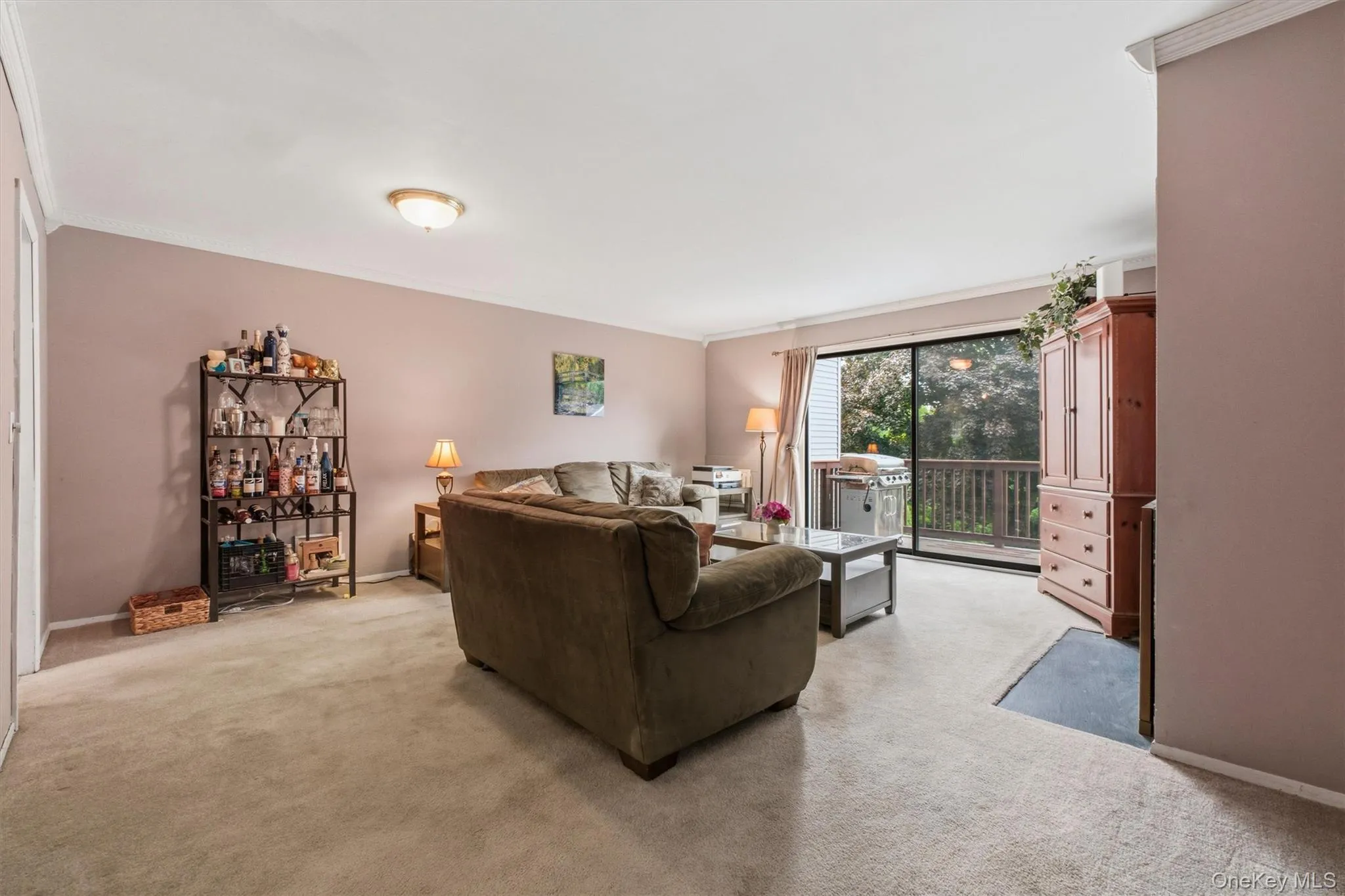 The spacious living room comfortably accommodates large furnishings. The spacious living room comfortably accommodates large furnishings.