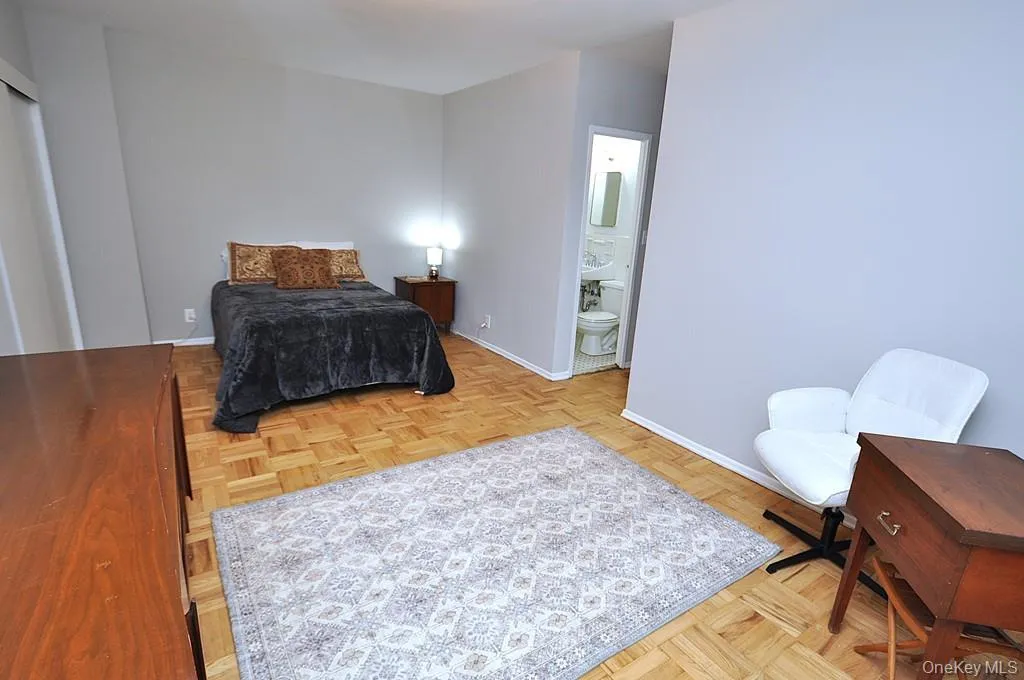 Primary bedroom has parquet floors and private bath with step in shower. The bedroom is large enough to accommodate a king size bedroom set and still have room for a comfy reading chair. The room is approx 18'-10" x 15'-5". Primary bedroom has parquet floors and private bath with step in shower. The bedroom is large enough to accommodate a king size bedroom set and still have room for a comfy reading chair. The room is approx 18'-10" x 15'-5".