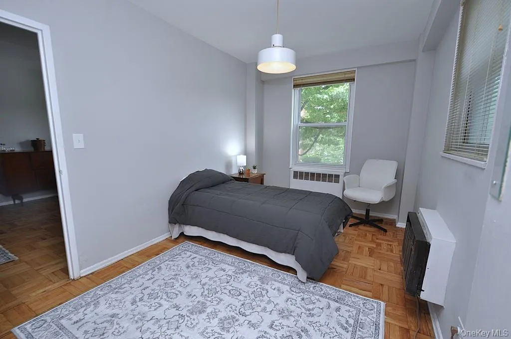 Corner Second Bedroom has a walk-in closet, parquet floors and can be used as a home office, den or guest room. The bedroom is approx 13'-1" x 8'-10". Corner Second Bedroom has a walk-in closet, parquet floors and can be used as a home office, den or guest room. The bedroom is approx 13'-1" x 8'-10".
