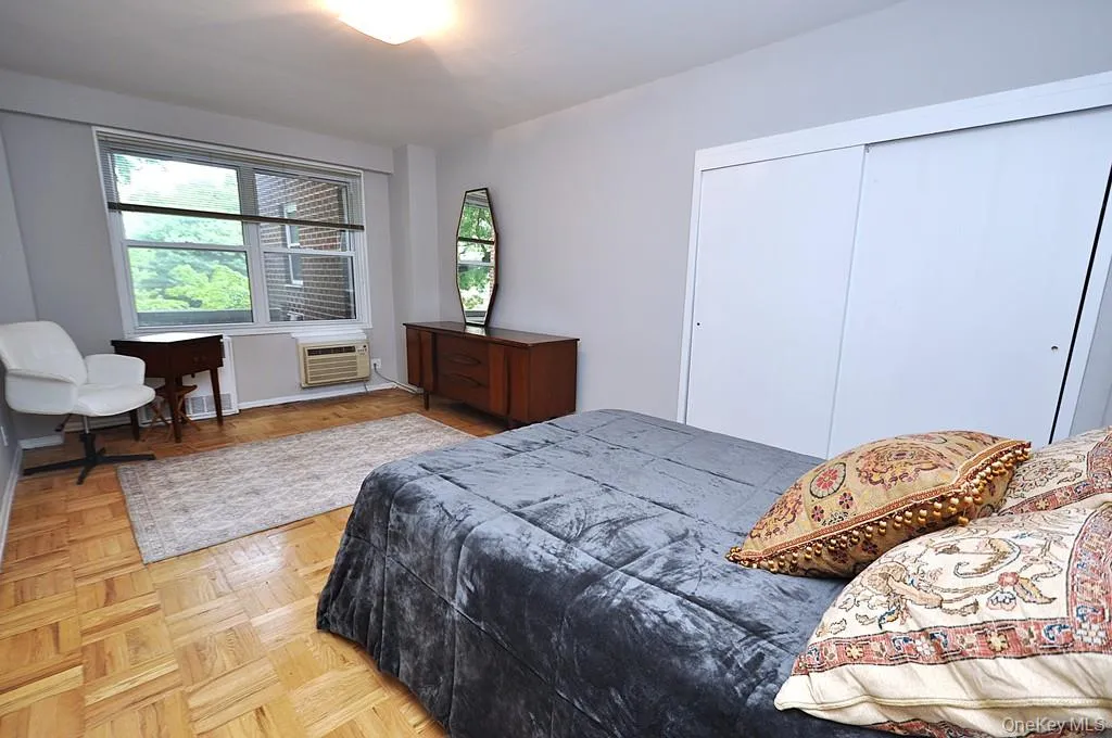 Primary bedroom has parquet floors and private bath with step in shower. The bedroom is large enough to accommodate a king size bedroom set and still have room for a comfy reading chair. The room is approx 18'-10" x 15'-5". Primary bedroom has parquet floors and private bath with step in shower. The bedroom is large enough to accommodate a king size bedroom set and still have room for a comfy reading chair. The room is approx 18'-10" x 15'-5".