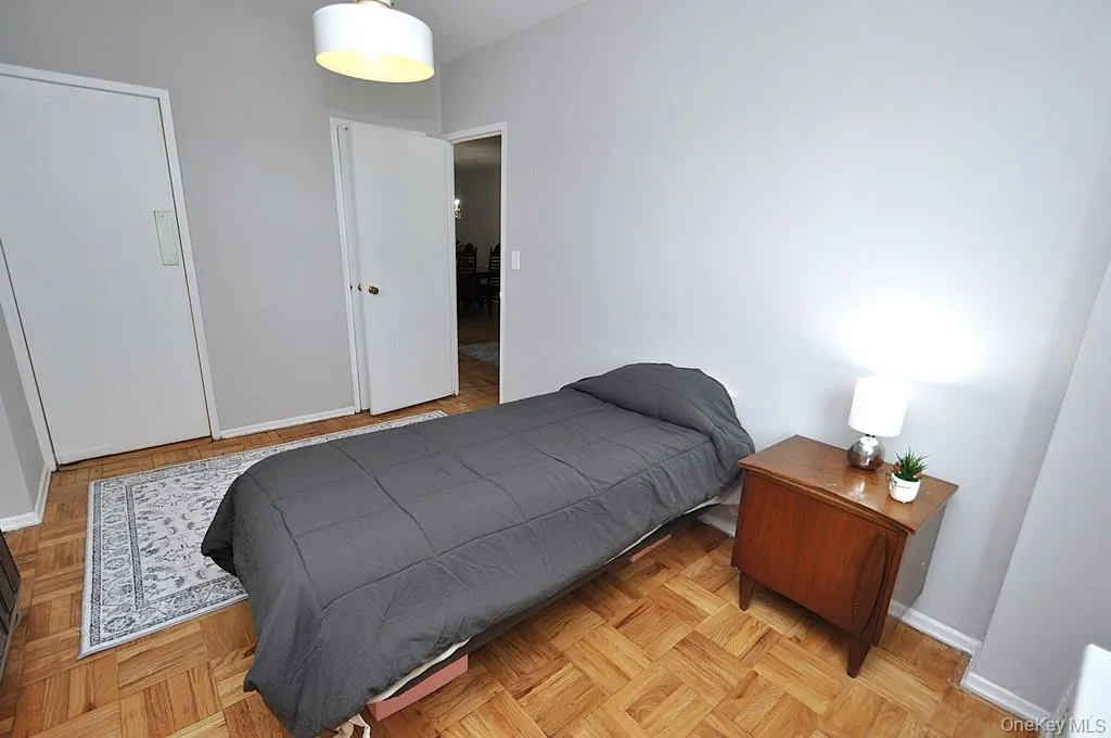 Corner Second Bedroom has a walk-in closet, parquet floors and can be used as a home office, den or guest room. The bedroom is approx 13'-1" x 8'-10". Corner Second Bedroom has a walk-in closet, parquet floors and can be used as a home office, den or guest room. The bedroom is approx 13'-1" x 8'-10".