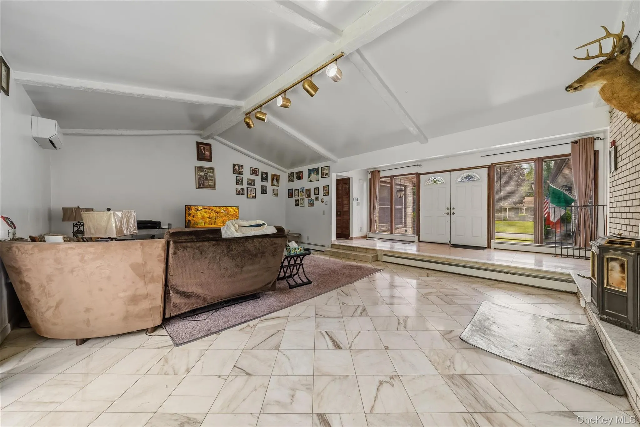 Living room with tile flooring Living room with tile flooring