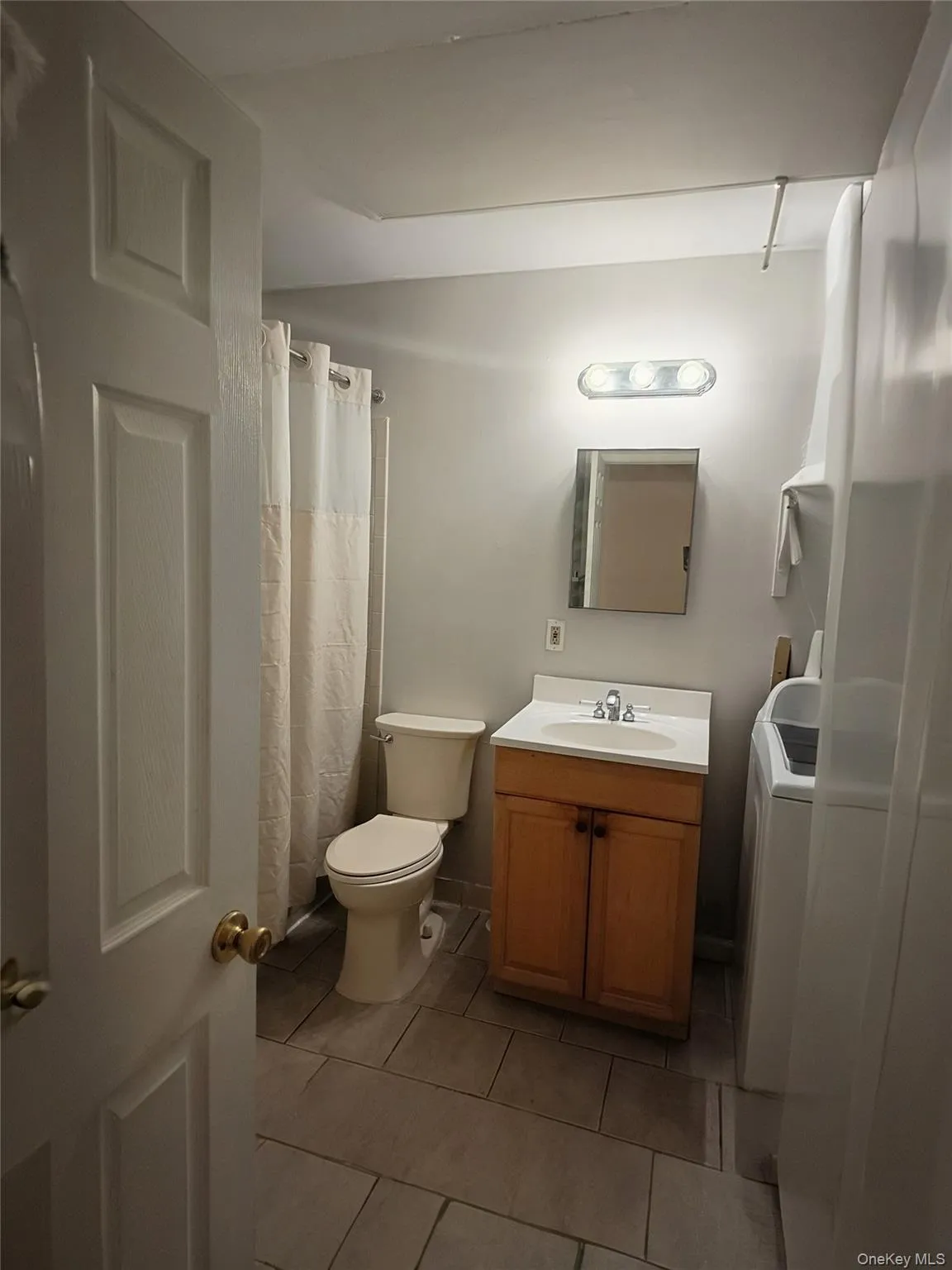 Full bath with ceramic tile and full tub. Full bath with ceramic tile and full tub.
