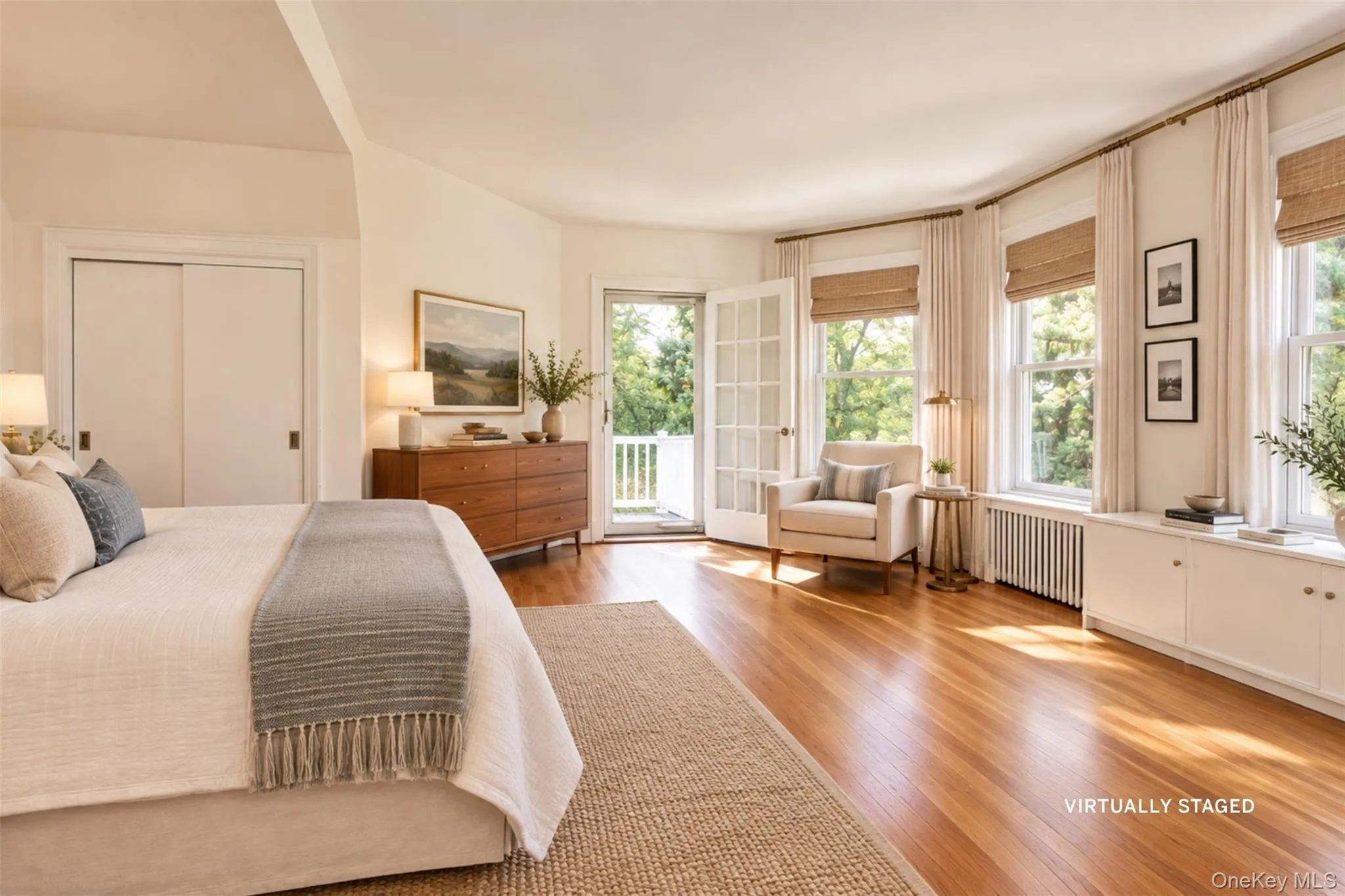 Primary Bedroom virtually staged with door to upper Deck Primary Bedroom virtually staged with door to upper Deck
