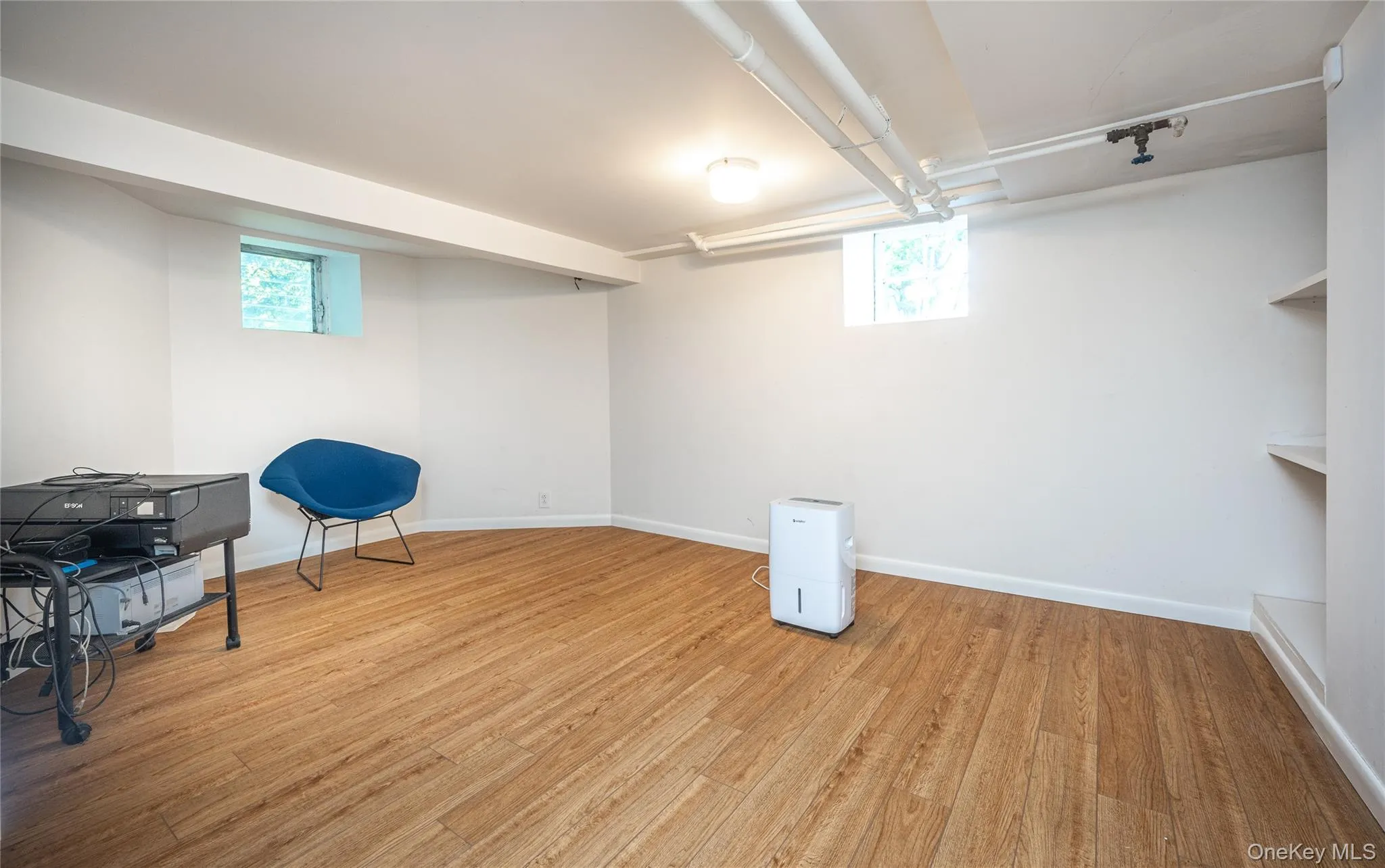 Basement with a separate room for office or art studio Basement with a separate room for office or art studio