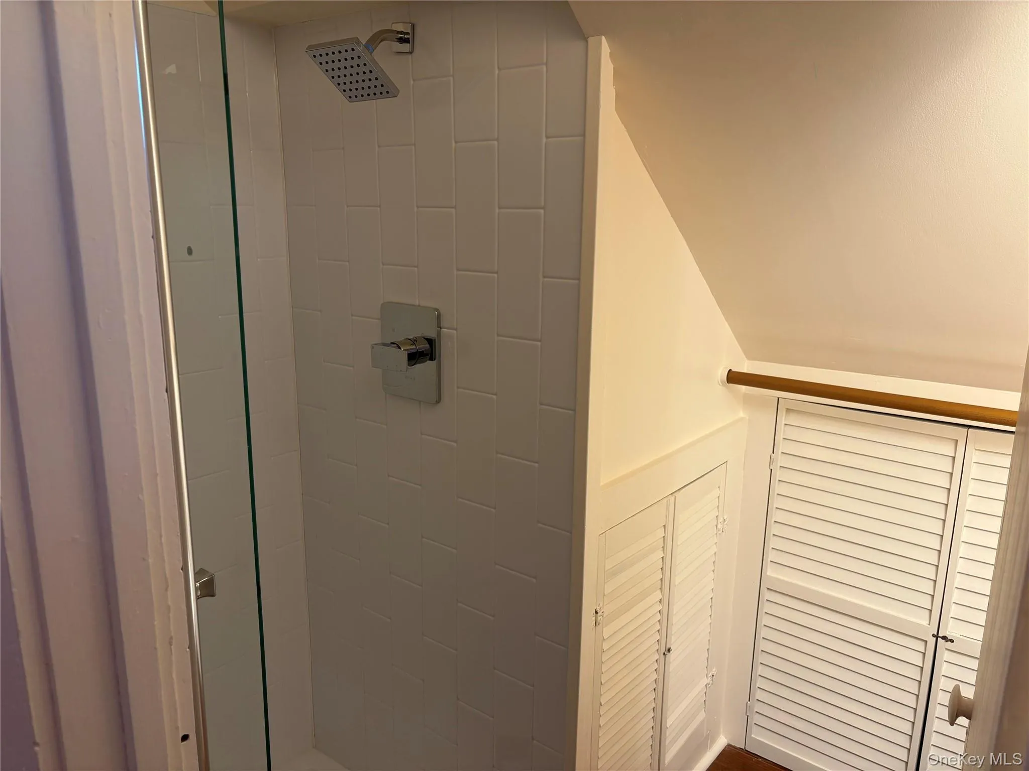 Bathroom with tiled shower Bathroom with tiled shower