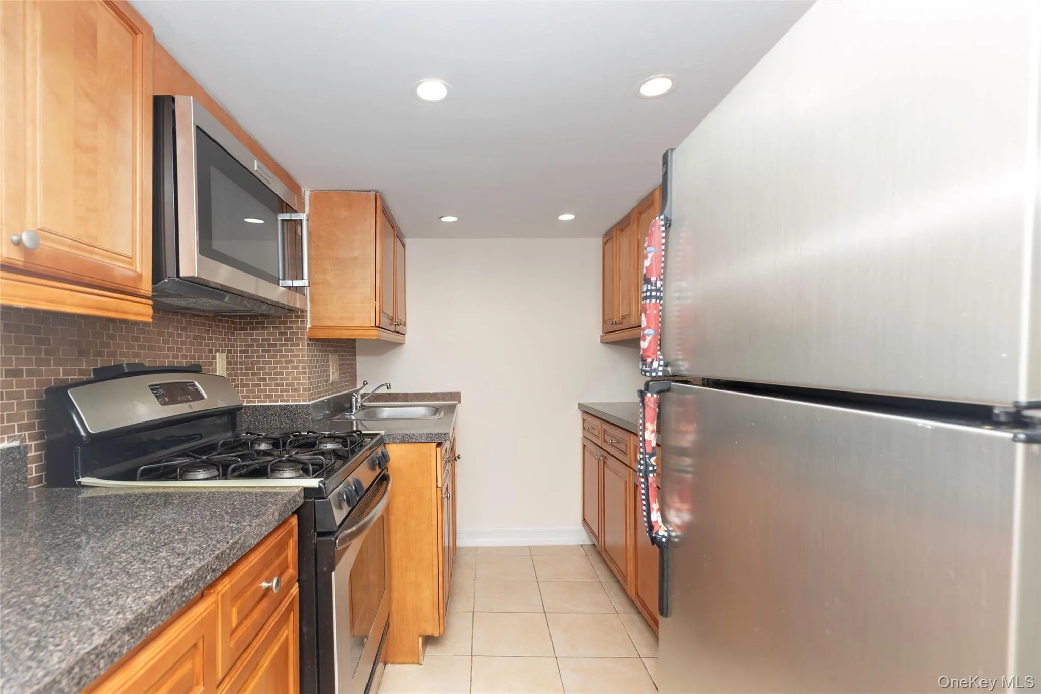 Renovated kitchen with stainless appliances Renovated kitchen with stainless appliances