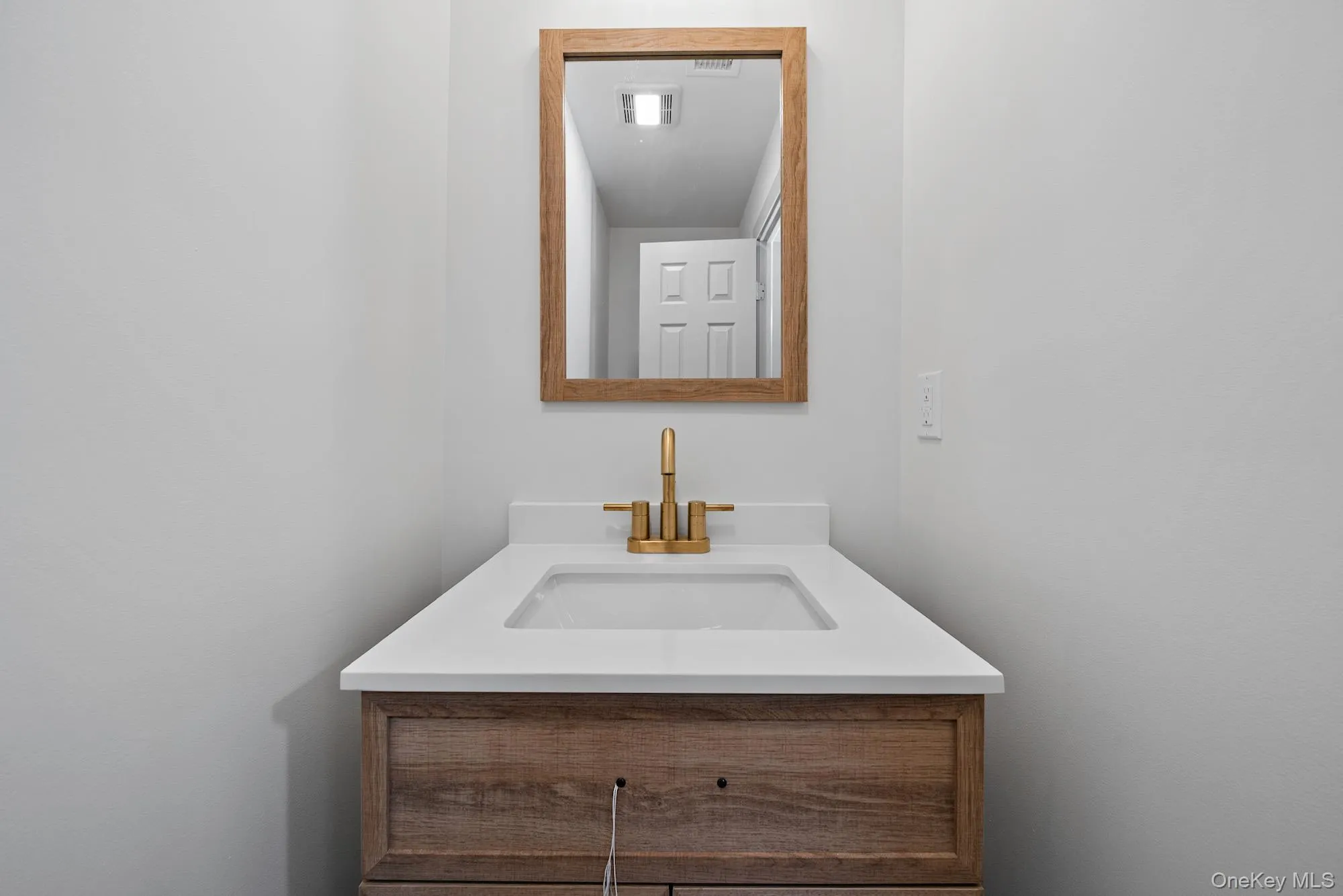 Half bath on the main level. Half bath on the main level.
