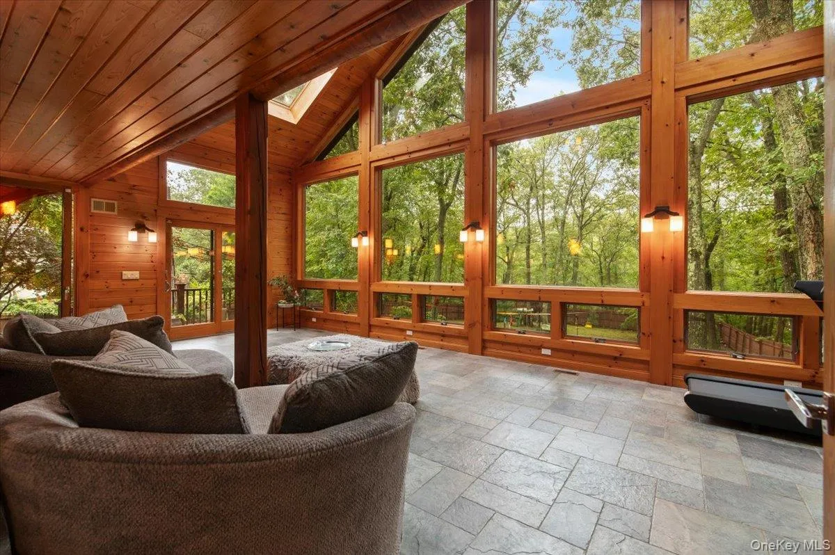 Floor to ceiling windows bring nature in. Floor to ceiling windows bring nature in.
