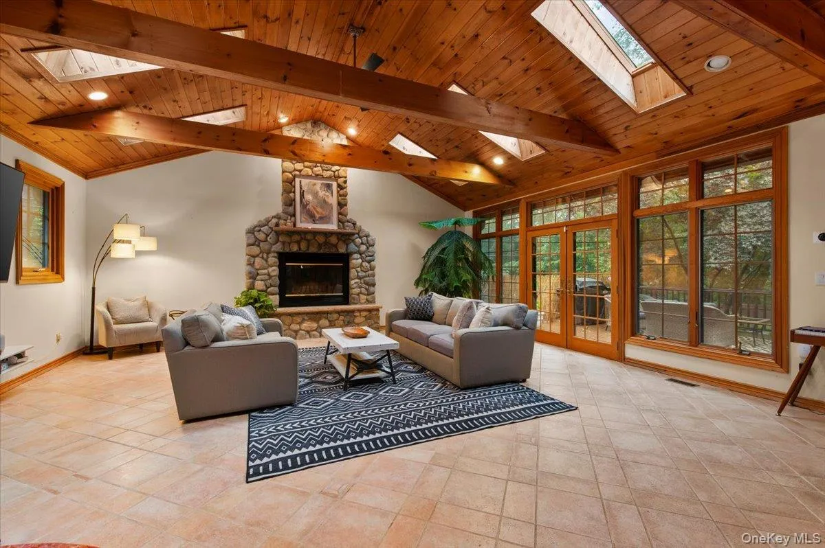 Doors lead to wrap around porch. Doors lead to wrap around porch.