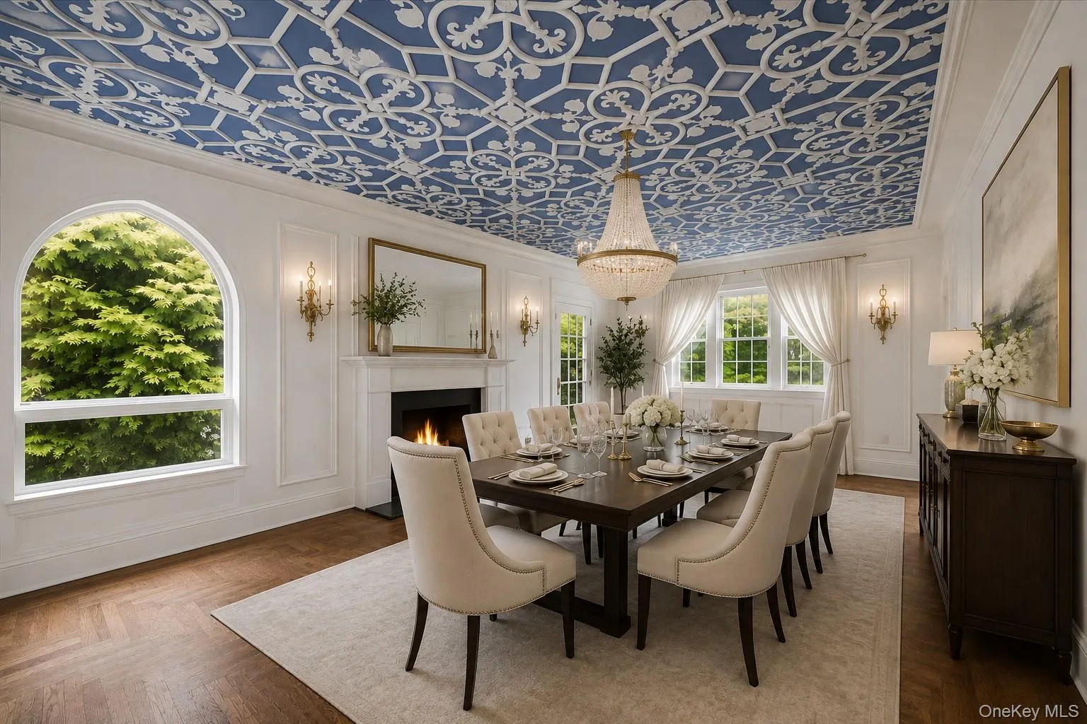 Elegant dining room with an ornamental plasterwork ceiling with another cozy fire place Elegant dining room with an ornamental plasterwork ceiling with another cozy fire place