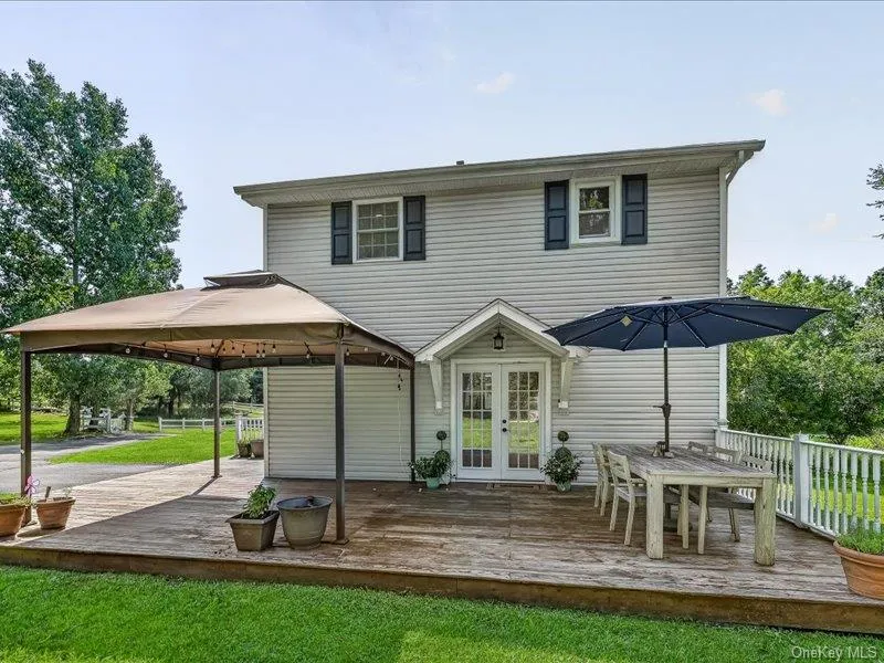 Fun back deck with pergola. Fun back deck with pergola.