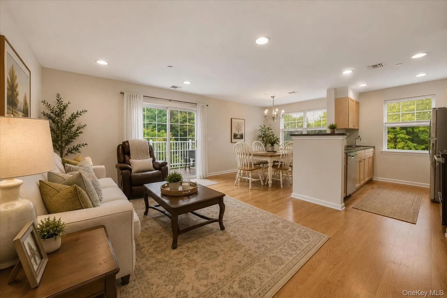 View of Living Room/Dining Room/Kitchen Virtually Staged View of Living Room/Dining Room/Kitchen Virtually Staged
