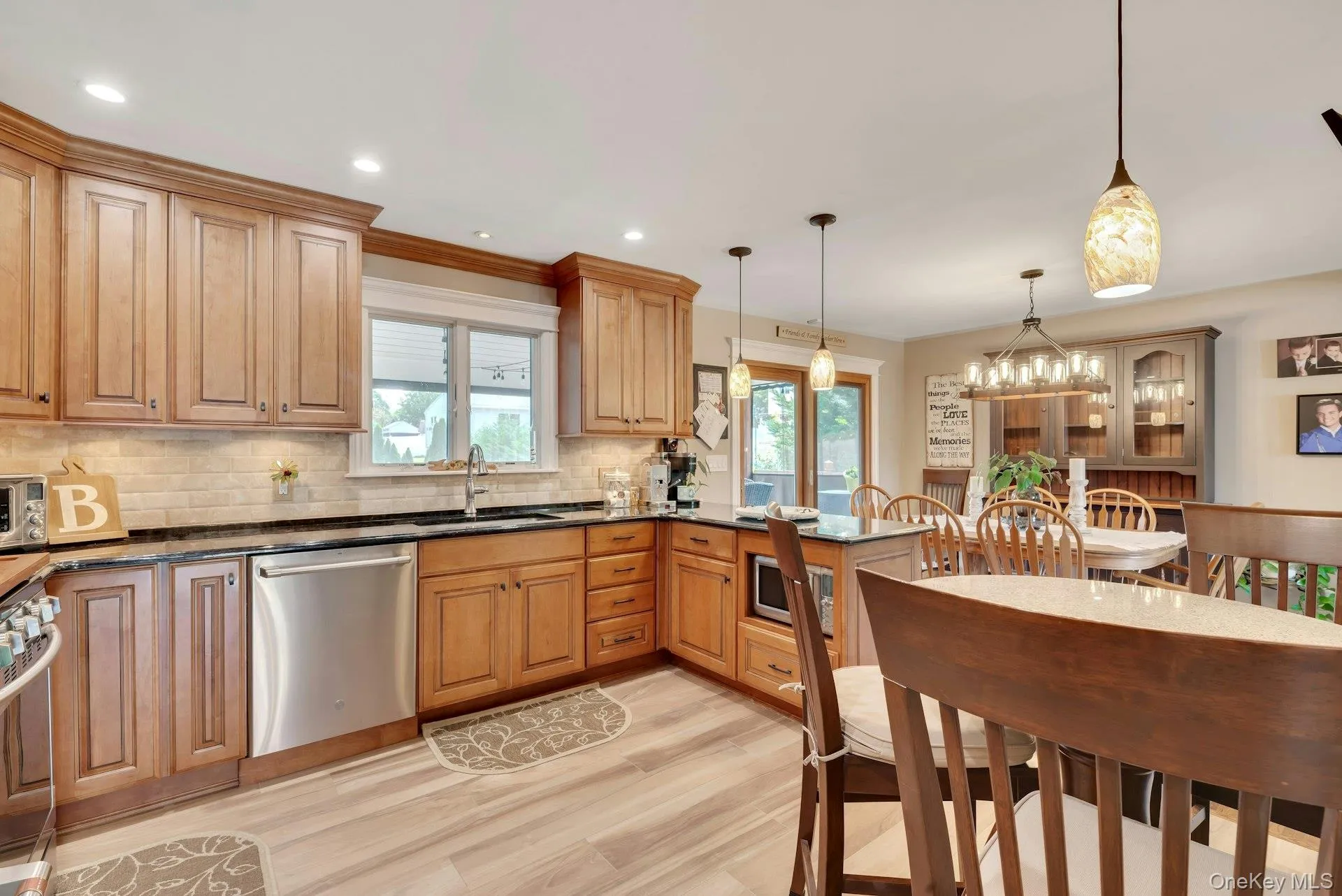Granite counters and under cabinet lighting invites you into the heart of the home Granite counters and under cabinet lighting invites you into the heart of the home