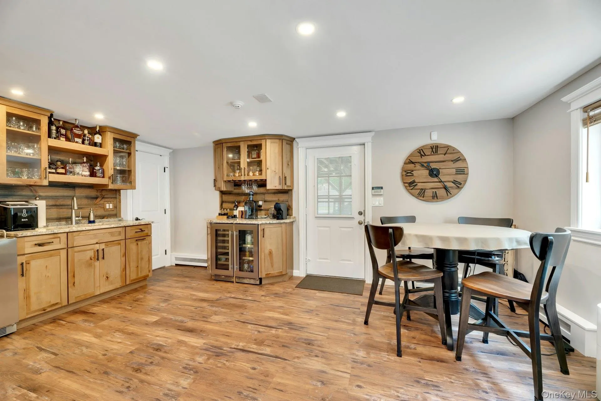 Wet Bar on Lower Level is a great entertaining area with exterior access too Wet Bar on Lower Level is a great entertaining area with exterior access too