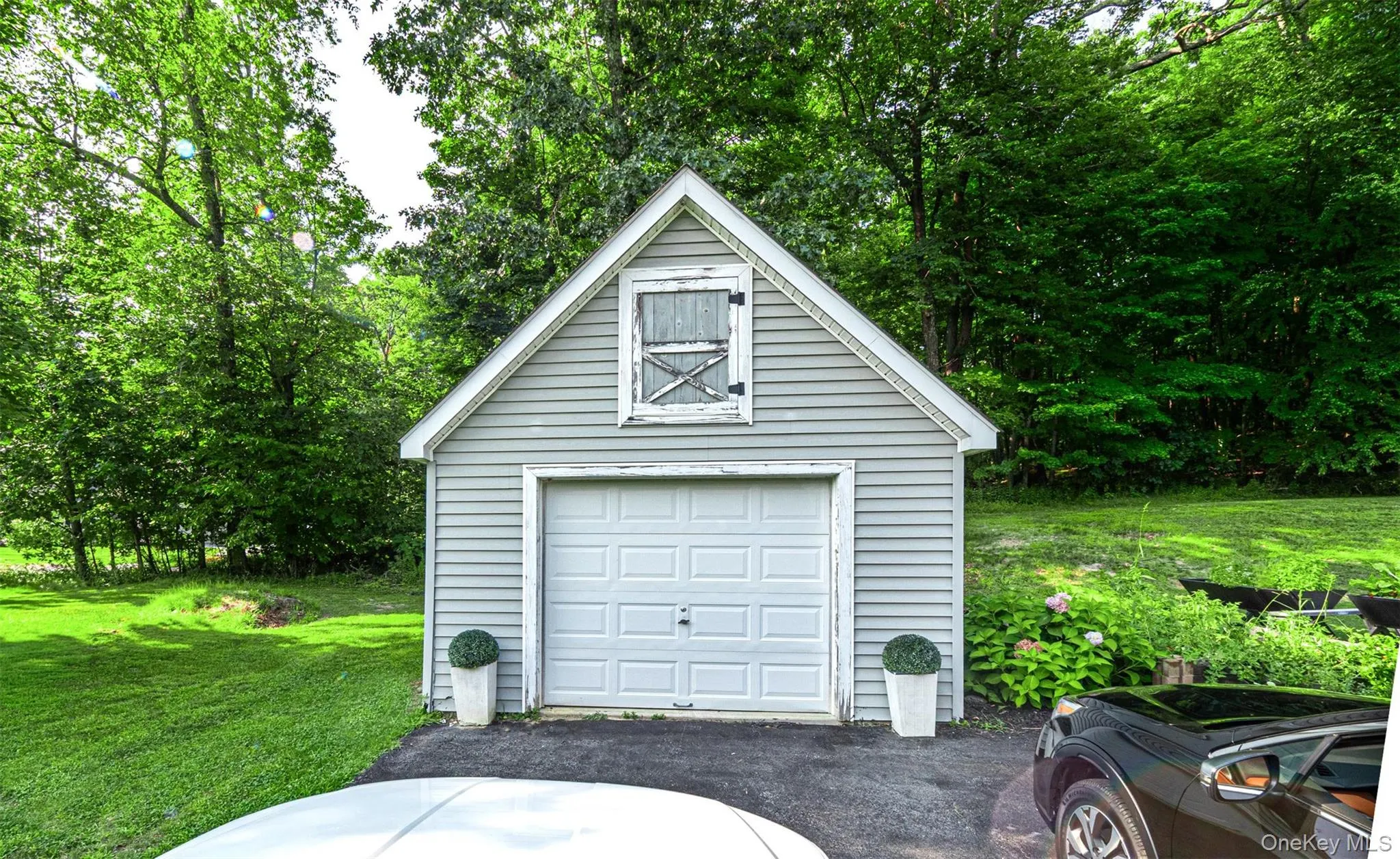 1 car garage with wide driveway 1 car garage with wide driveway