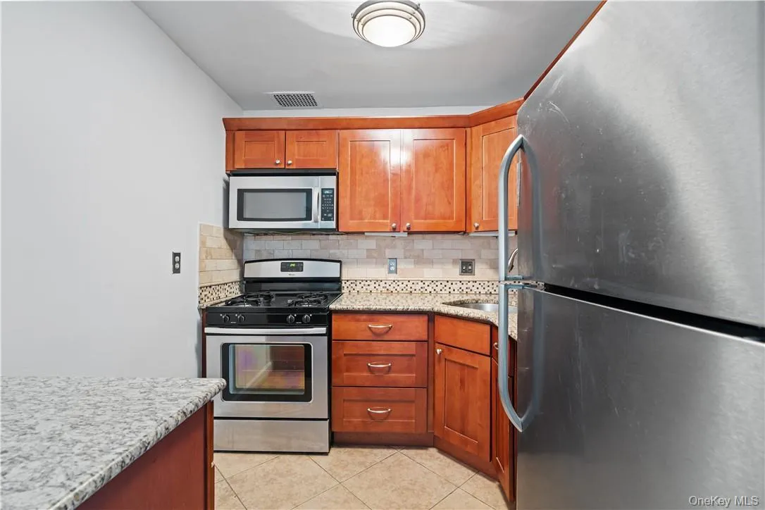 kitchen with stainless steel appliances kitchen with stainless steel appliances