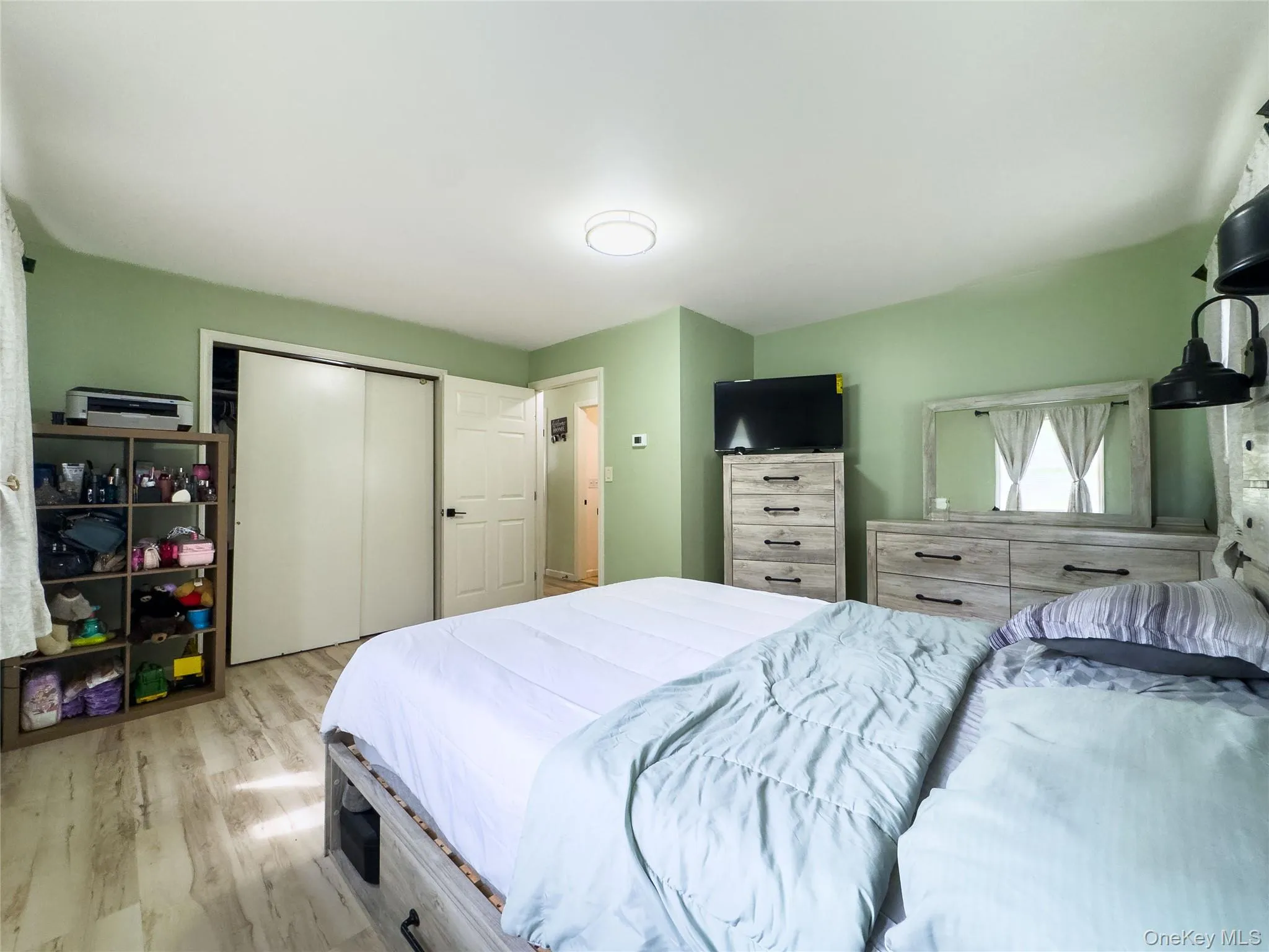 Wood-finish flooring throughout, sliding closet doors, and recessed lighting Wood-finish flooring throughout, sliding closet doors, and recessed lighting