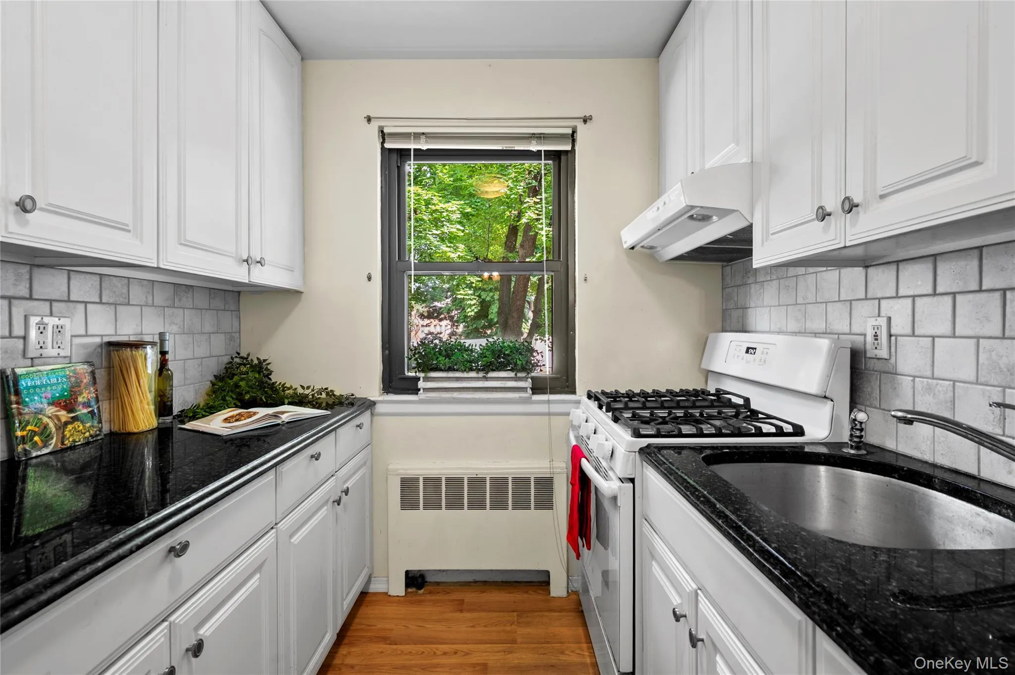 Kitchen with window facing Manor House drive Kitchen with window facing Manor House drive