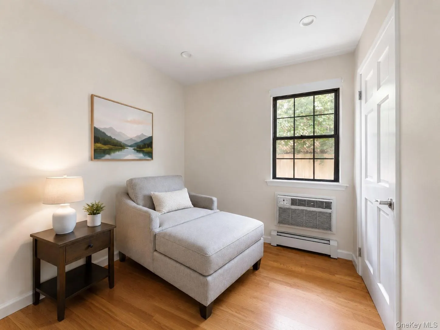 Recessed lighting and wood-finish flooring complement the neutral wall tones Recessed lighting and wood-finish flooring complement the neutral wall tones