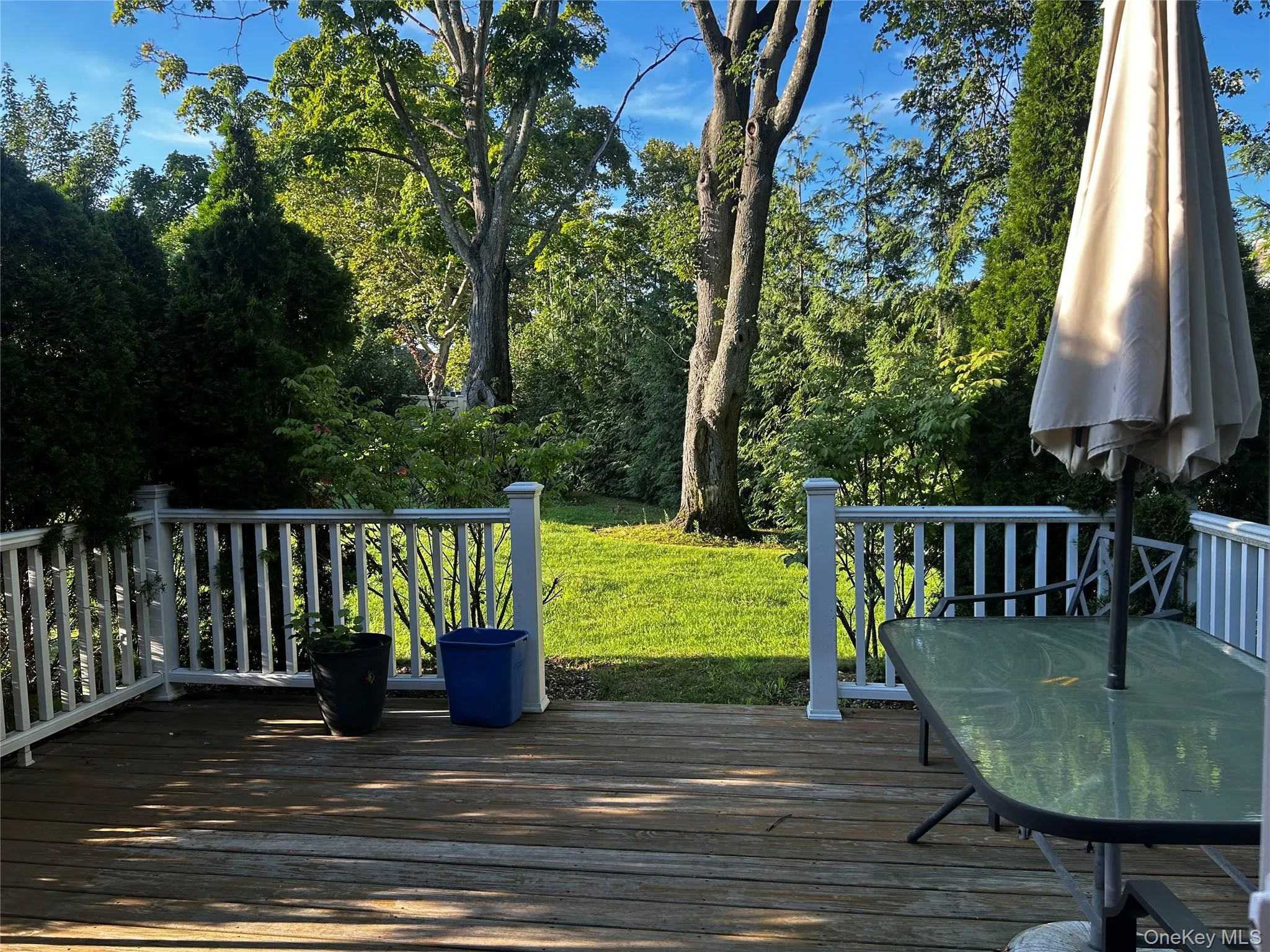 Private Wood deck with white railing (no access to the yard) Private Wood deck with white railing (no access to the yard)