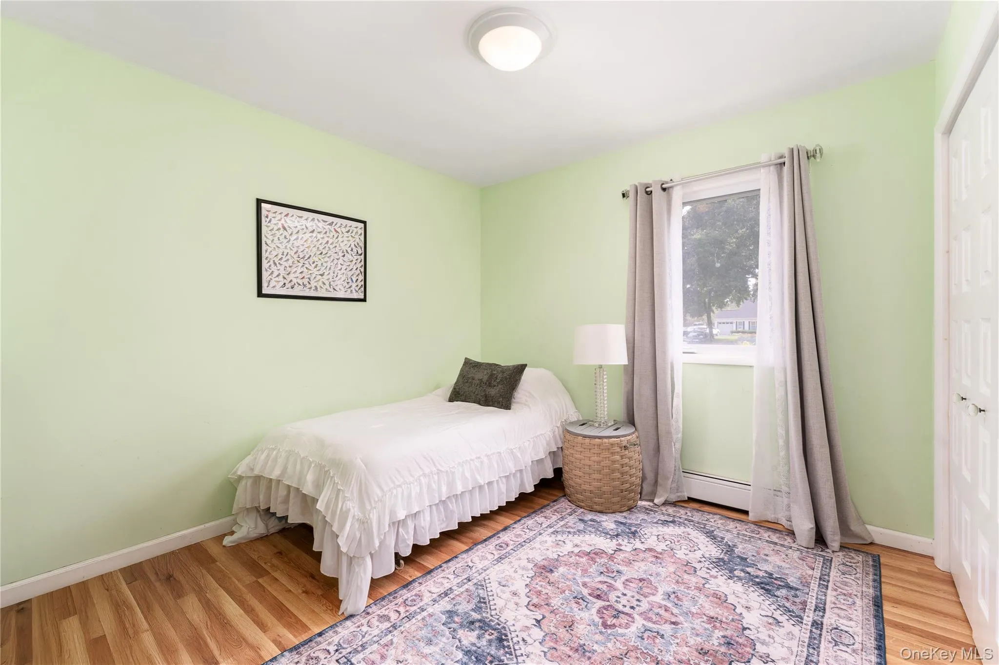 1 of 3 with overhead light, laminate wood look flooring 1 of 3 with overhead light, laminate wood look flooring