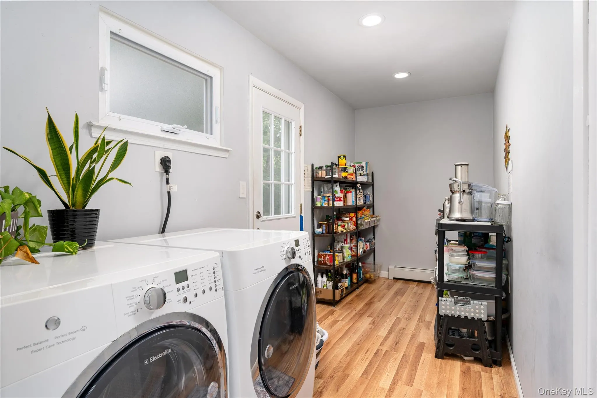 Convenient laundry room with outside entry to the yard, pantry/mudroom. Electrolux washer and dryer Convenient laundry room with outside entry to the yard, pantry/mudroom. Electrolux washer and dryer
