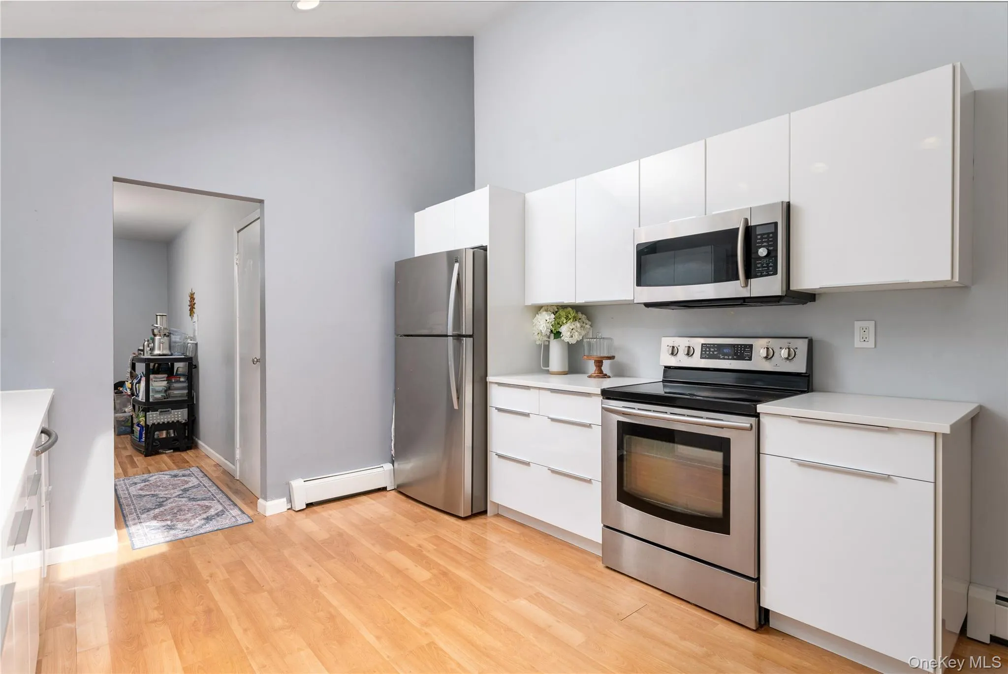 Stainless steel appliances: Samsung stove, microwave, and disshwasher, Kenmore refrigerator Stainless steel appliances: Samsung stove, microwave, and disshwasher, Kenmore refrigerator