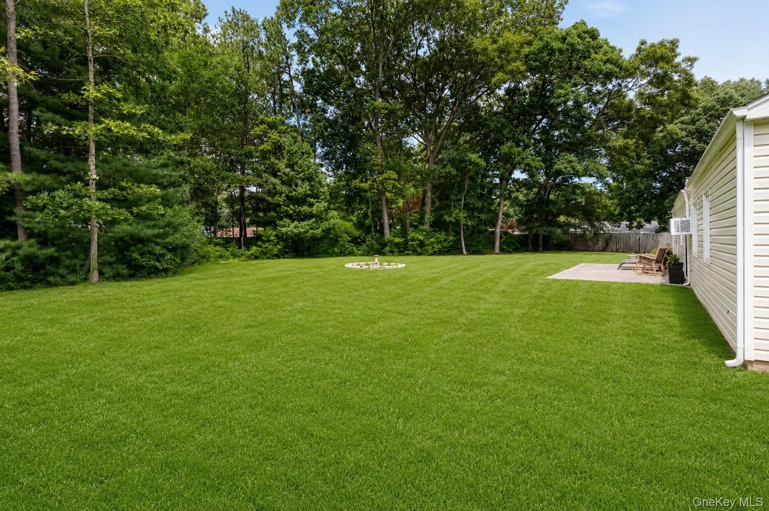 0.56-acre flat property with patio - digitally enhanced grass. Copy of survey available. 0.56-acre flat property with patio - digitally enhanced grass. Copy of survey available.