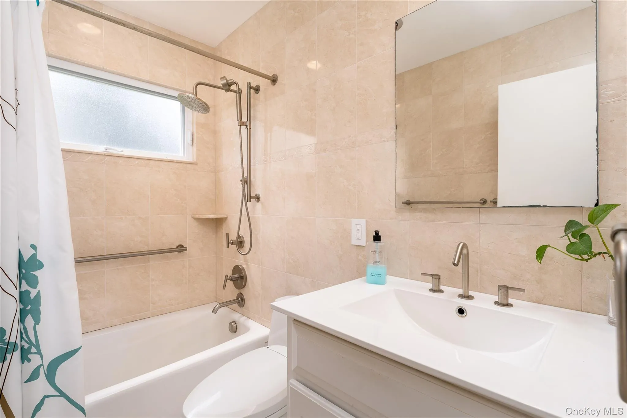 Full bath with tub/shower, Kohler fixtures, heat lamp Full bath with tub/shower, Kohler fixtures, heat lamp