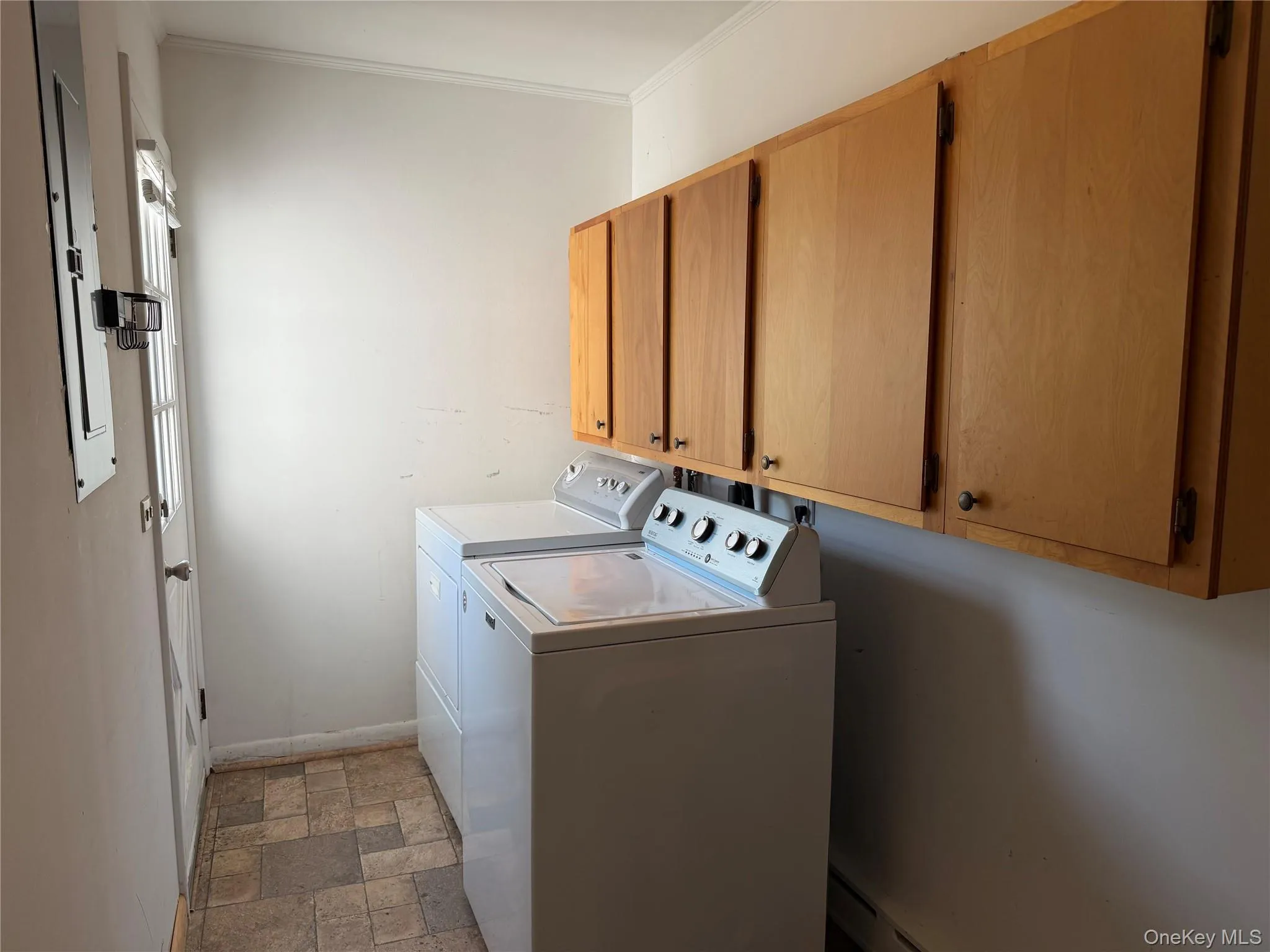 Laundry Room conveniently just inside from Garage and off of the Kitchen Laundry Room conveniently just inside from Garage and off of the Kitchen