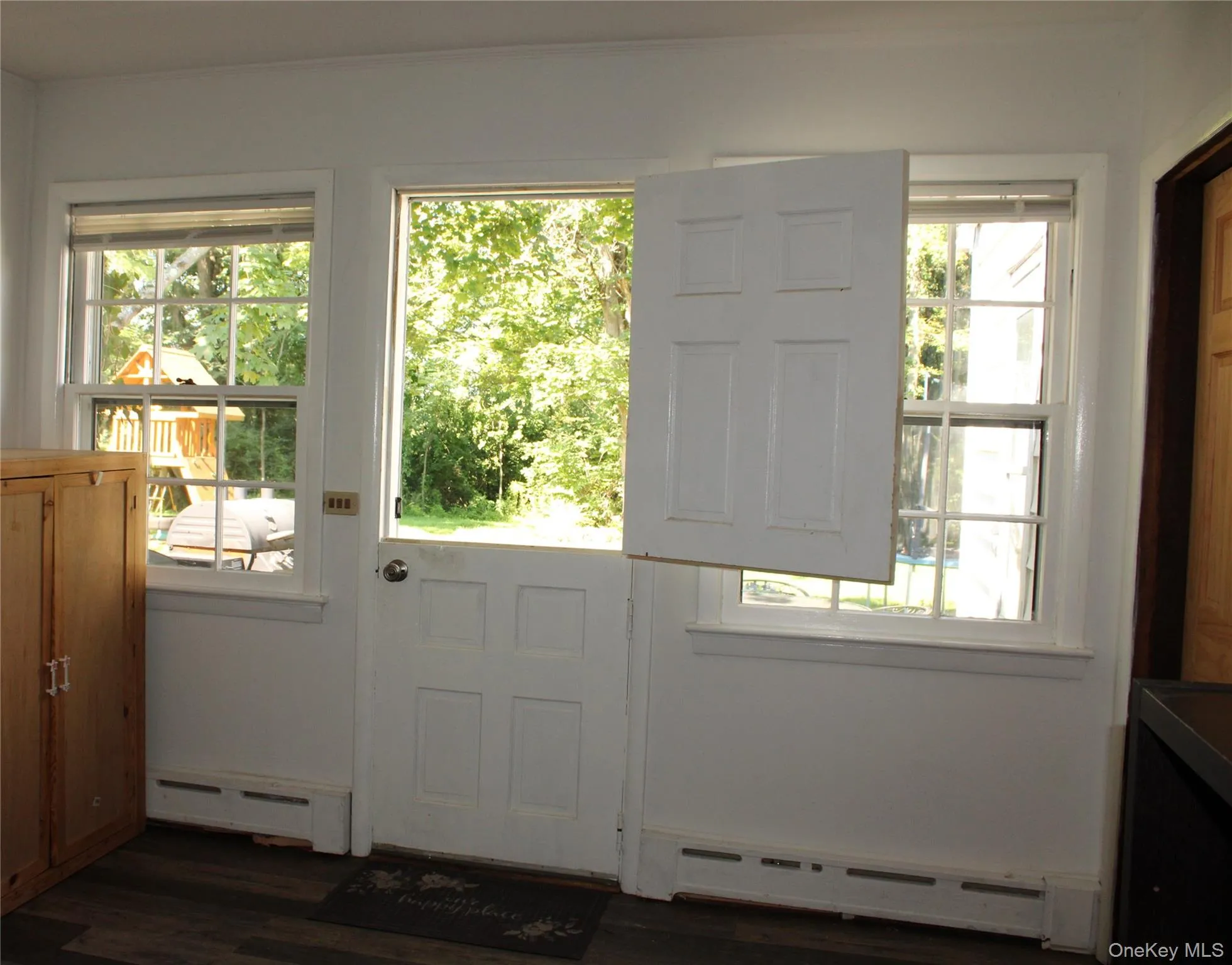 Dutch door opens to the patio and backyard Dutch door opens to the patio and backyard