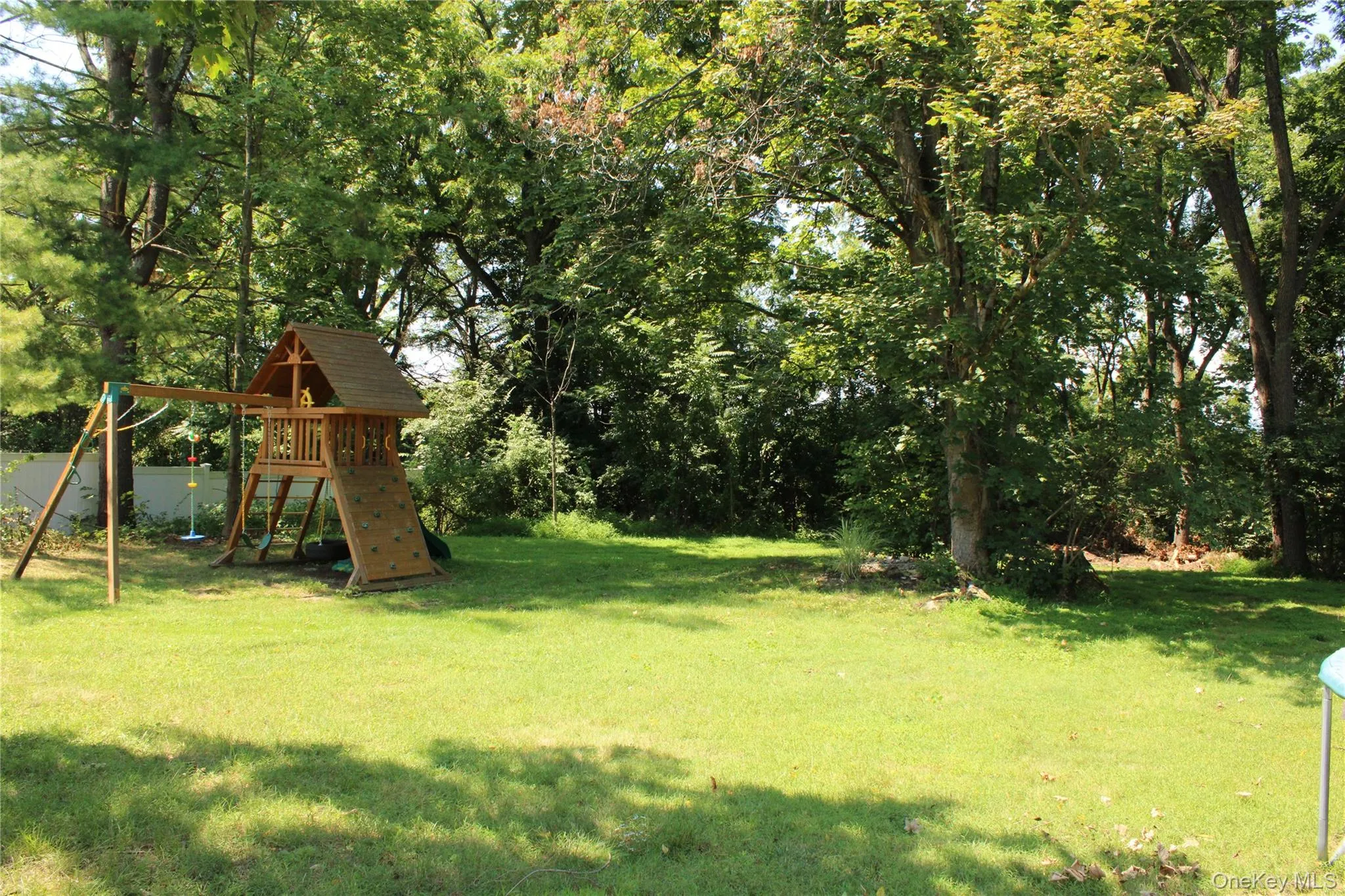 Park-like backyard with plenty of room. Mature trees provide a natural border and shade! Park-like backyard with plenty of room. Mature trees provide a natural border and shade!