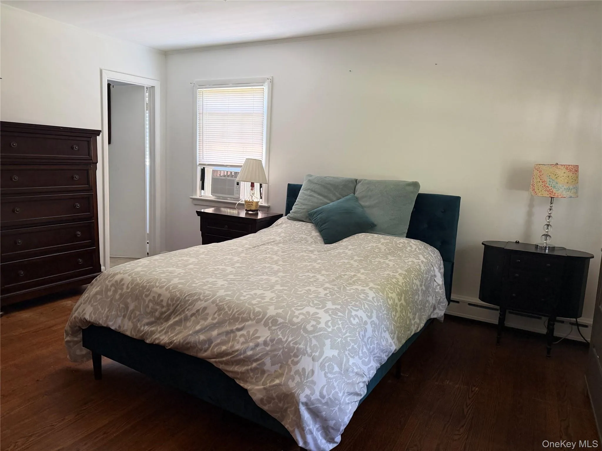 Primary Bedroom has hardwood floors and en-suite bathroom with stall shower Primary Bedroom has hardwood floors and en-suite bathroom with stall shower
