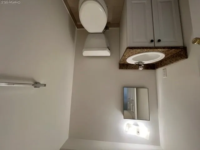 Powder Room in Basement Powder Room in Basement
