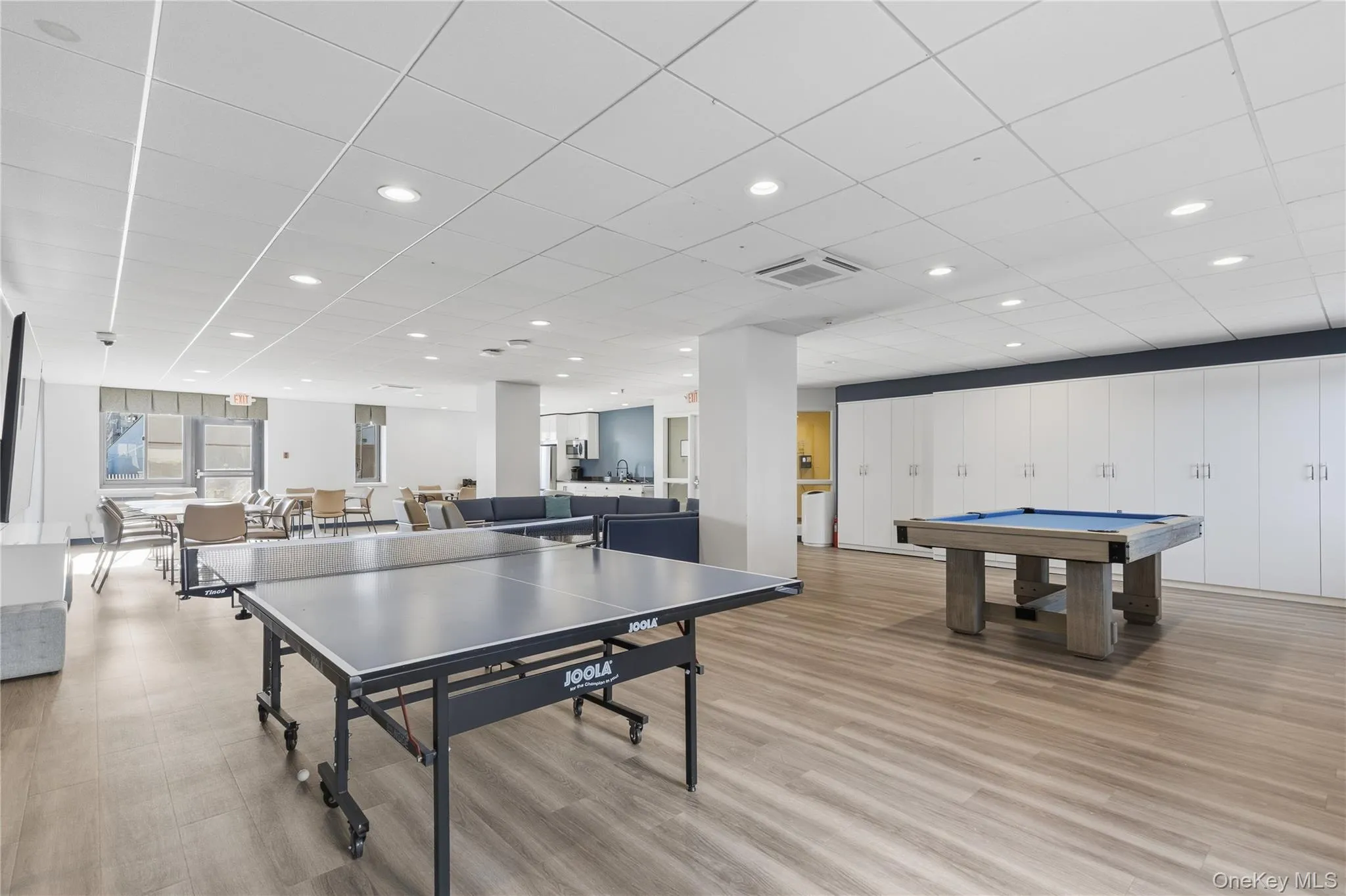 Party room with kitchen, large screen tv, pool table and ping pong Party room with kitchen, large screen tv, pool table and ping pong
